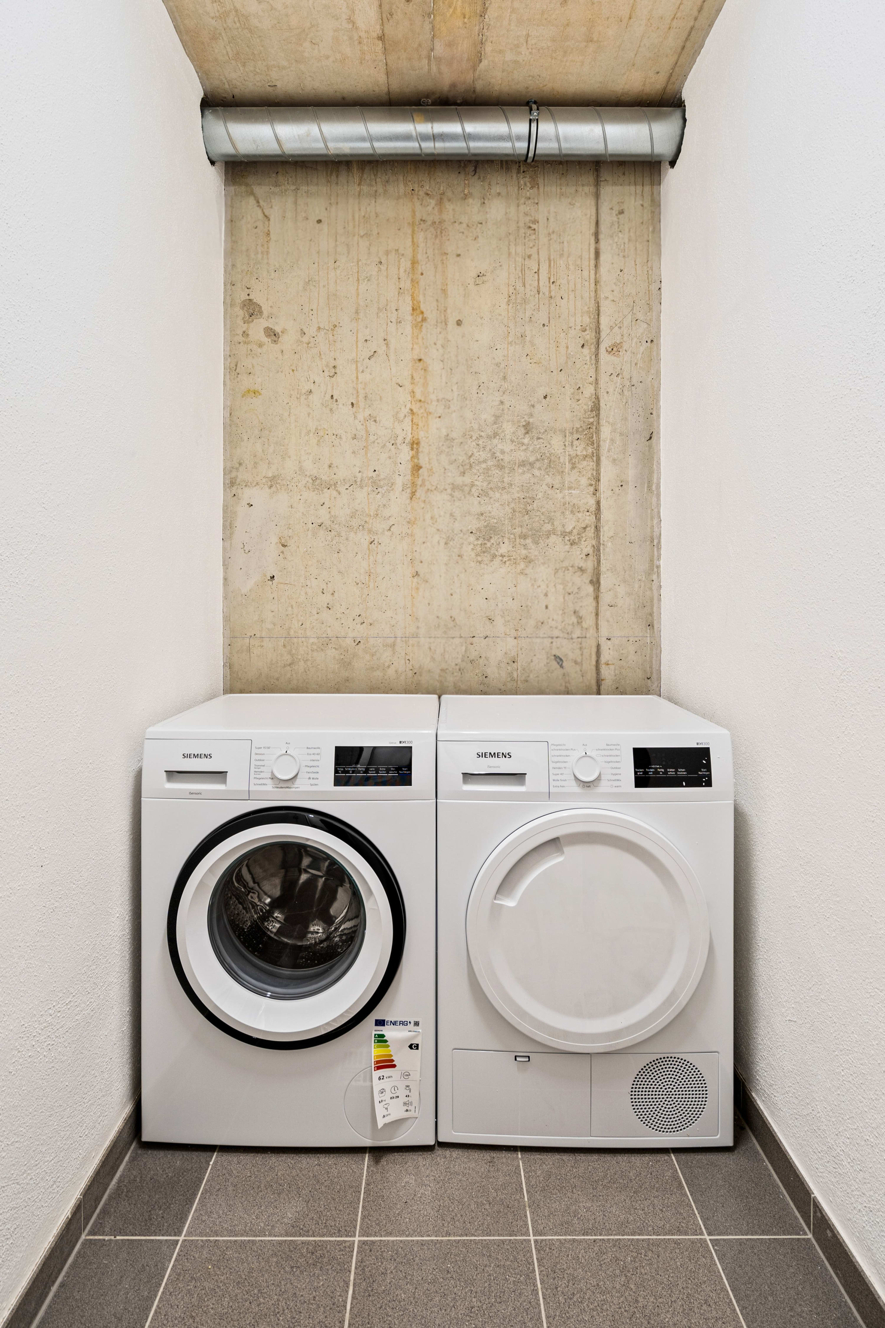 Modern in-unit laundry appliances for your convenience.