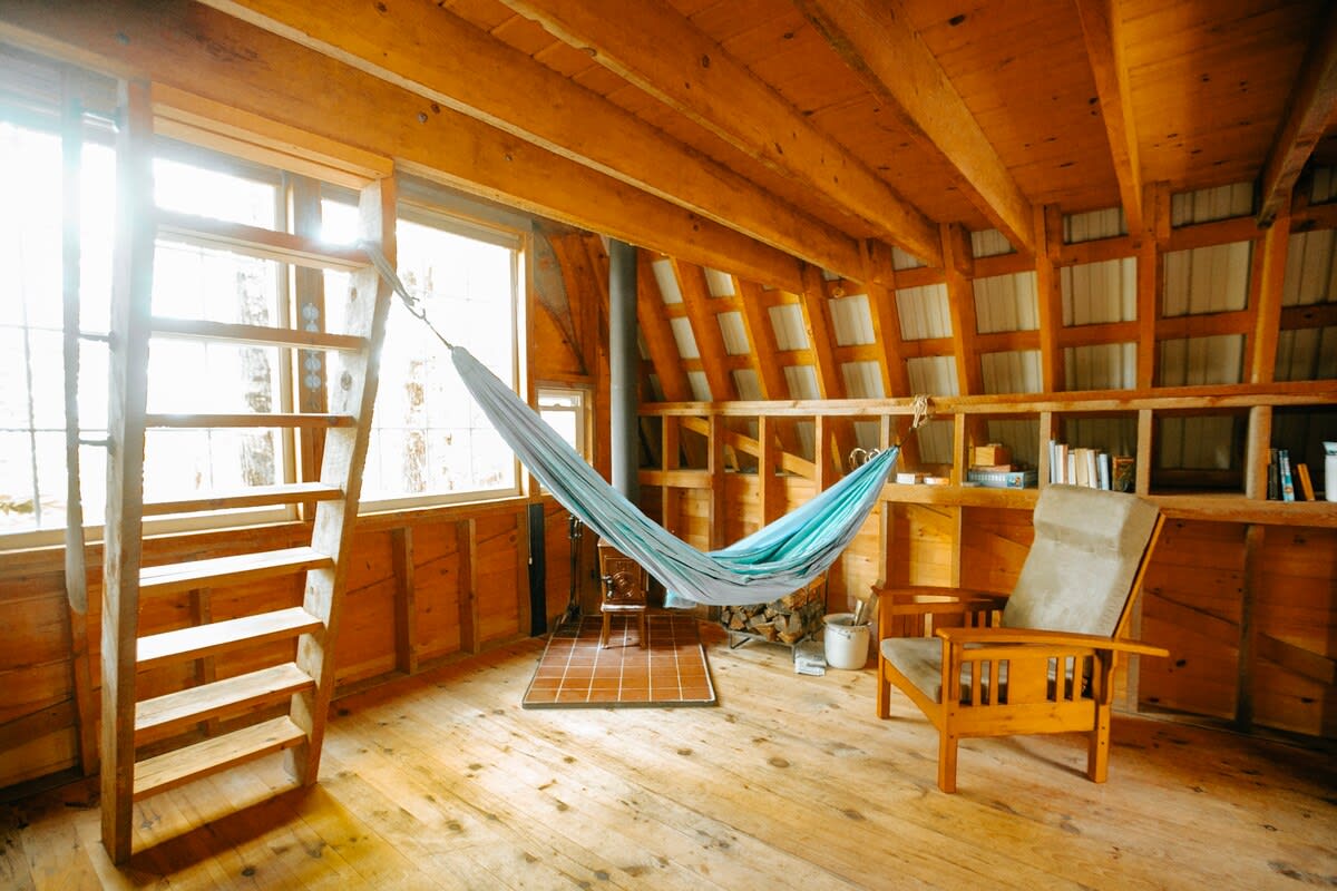 An indoor hammock for lounging in front of the wood stove.