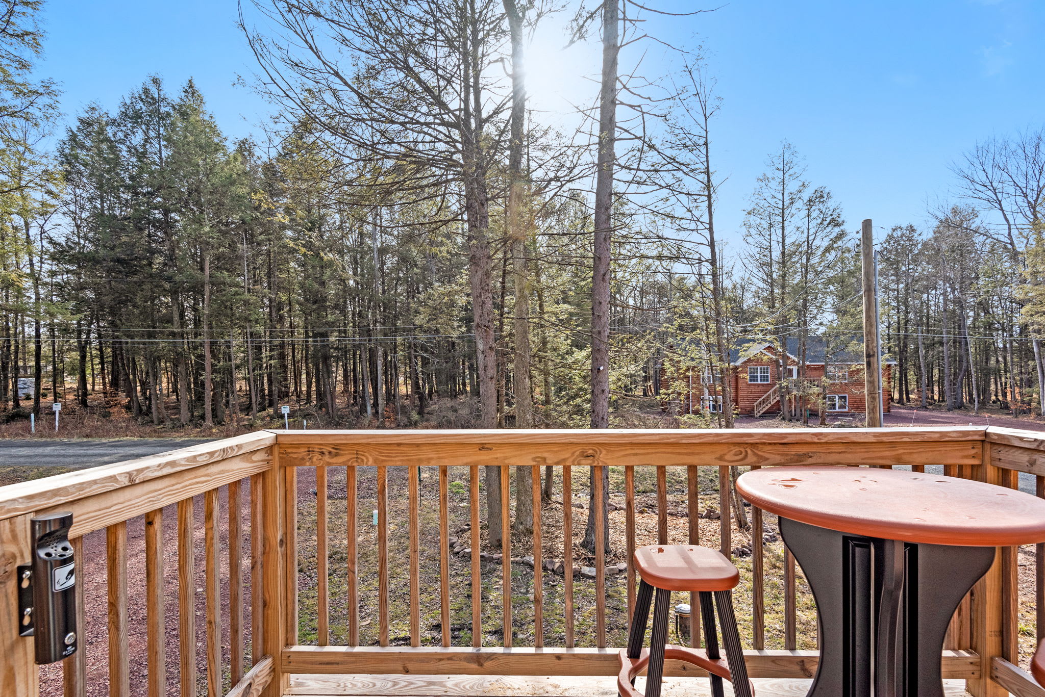 Forest-View Deck Seating
Enjoy morning coffee or an afternoon drink at this bistro-style table overlooking the trees a simple, serene outdoor spot to take it all in.