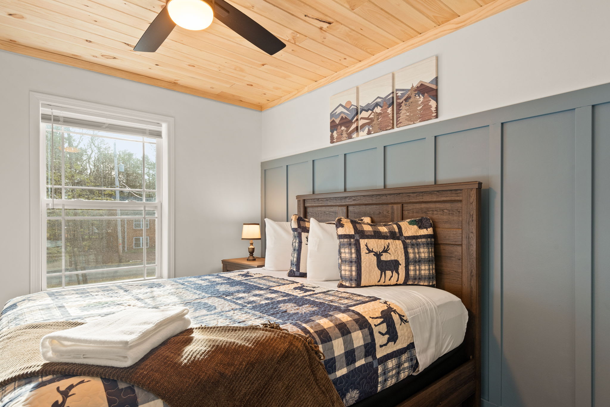 Natural light, vaulted ceilings, and cozy bedding bring together the warmth of the mountains and the ease of home.