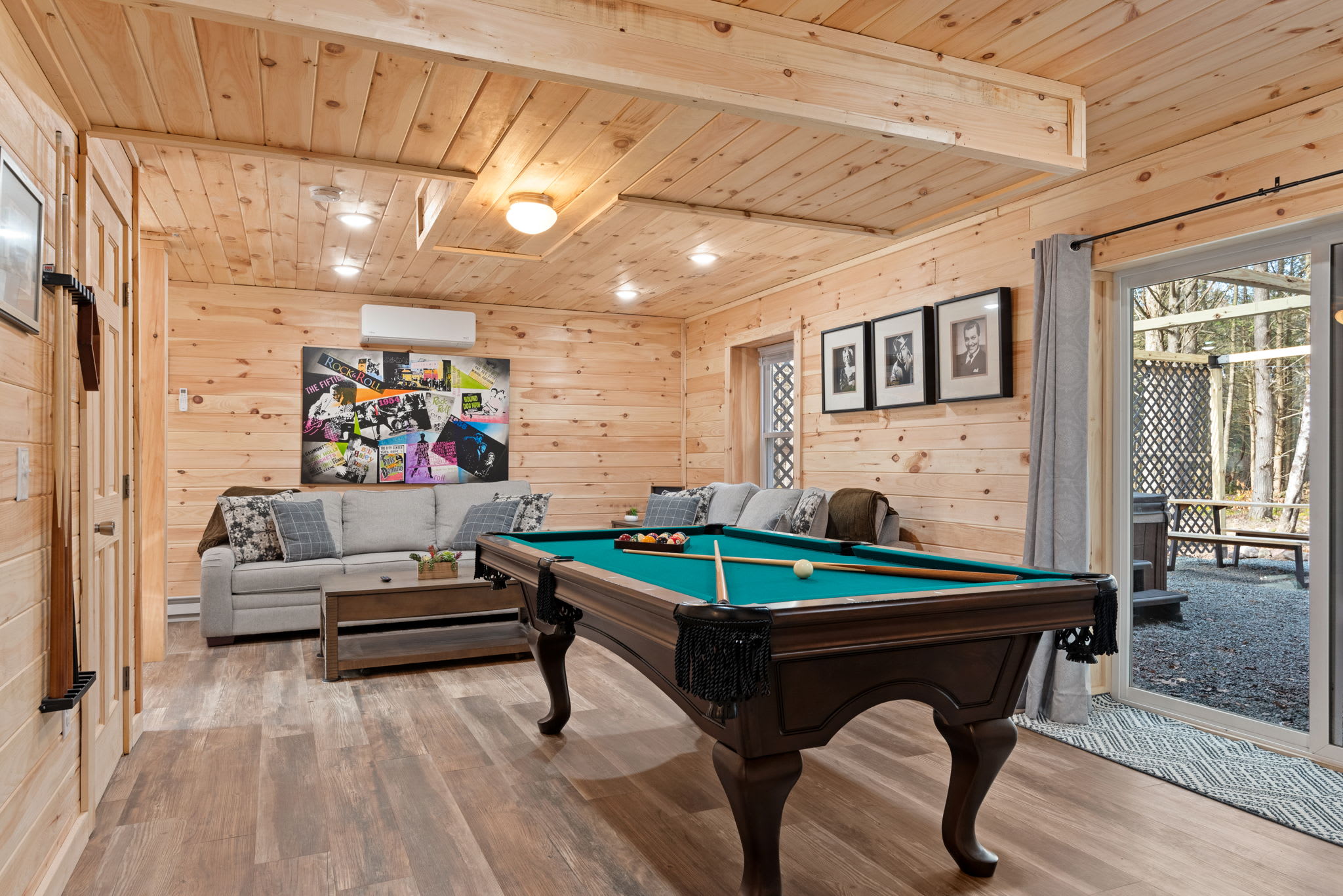 The Ultimate Hangout
Whether it’s a competitive round of pool or a laid-back evening on the sectional, this game room is designed for fun and memory-making.