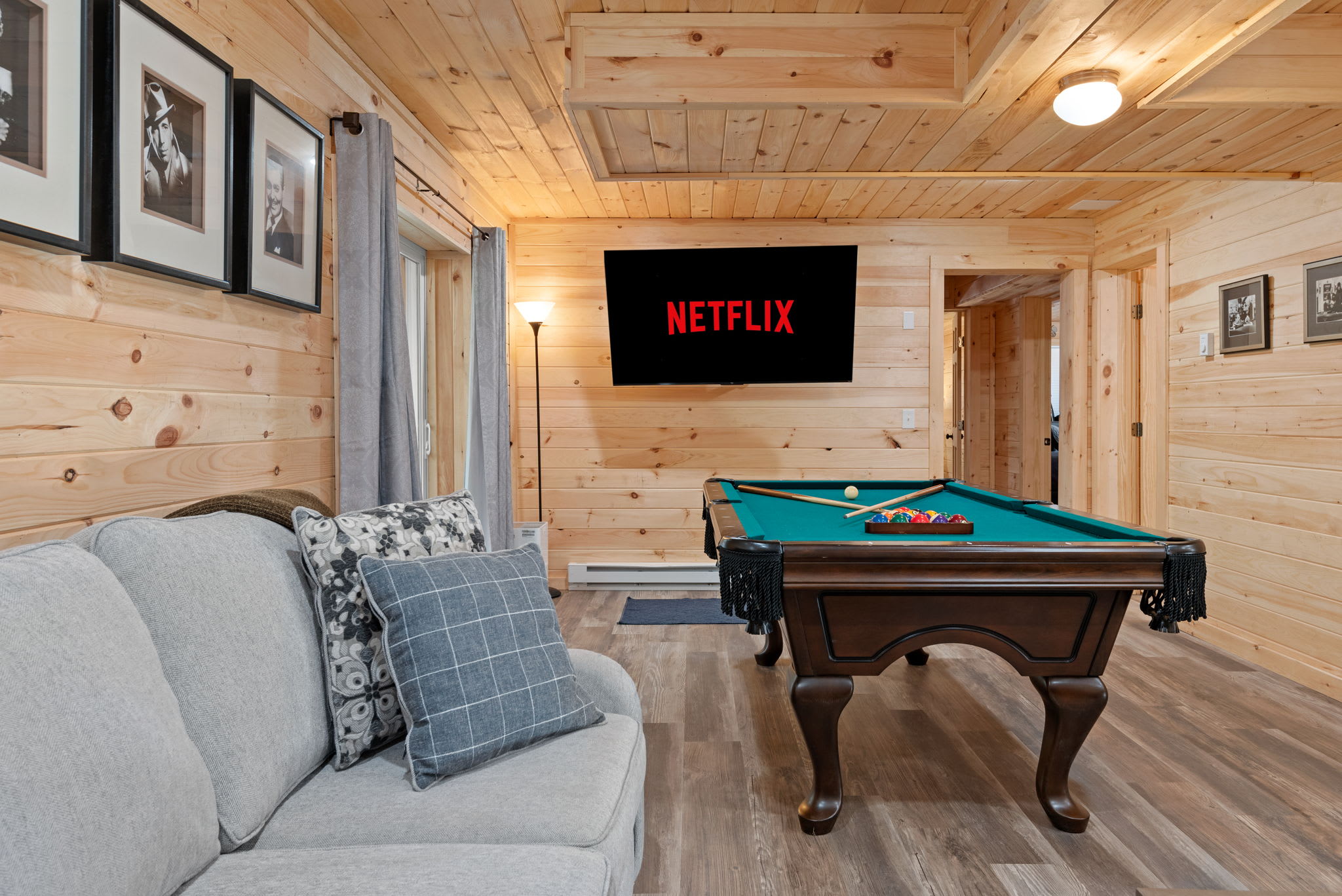 Kick back on the couch or take your best shot on the pool table this space is made for evenings full of laughter and low-key fun.