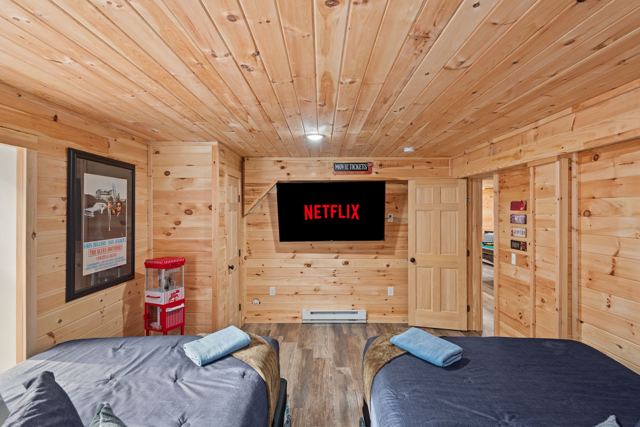 Movie Nights Just Got an Upgrade
Watch Netflix from bed, surrounded by theater posters, warm lighting, and a layout that’s as comfy as it is cool.