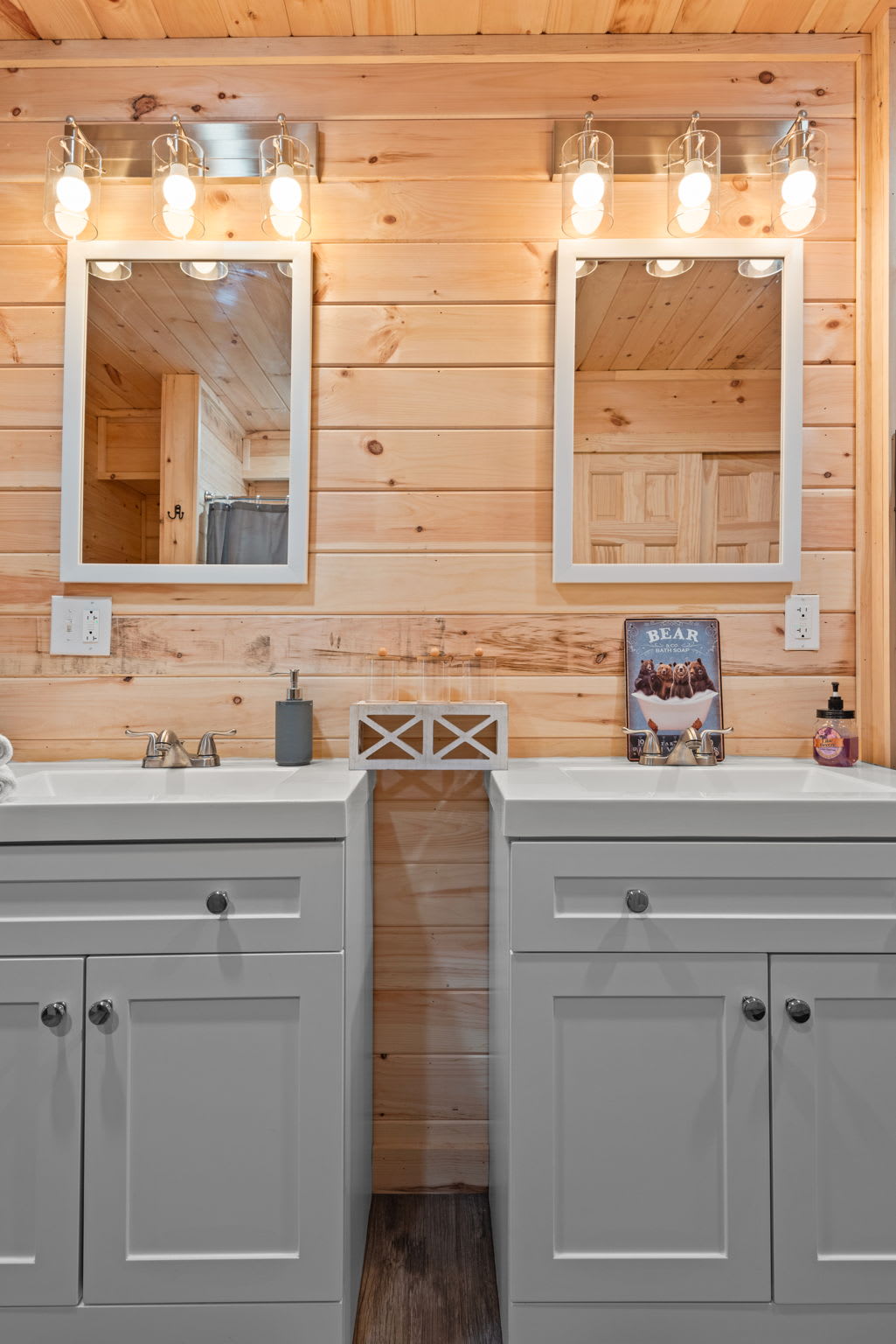The rustic bathroom is stocked with the essentials and offers plenty of counter space making mornings easy whether you're solo or with the crew.