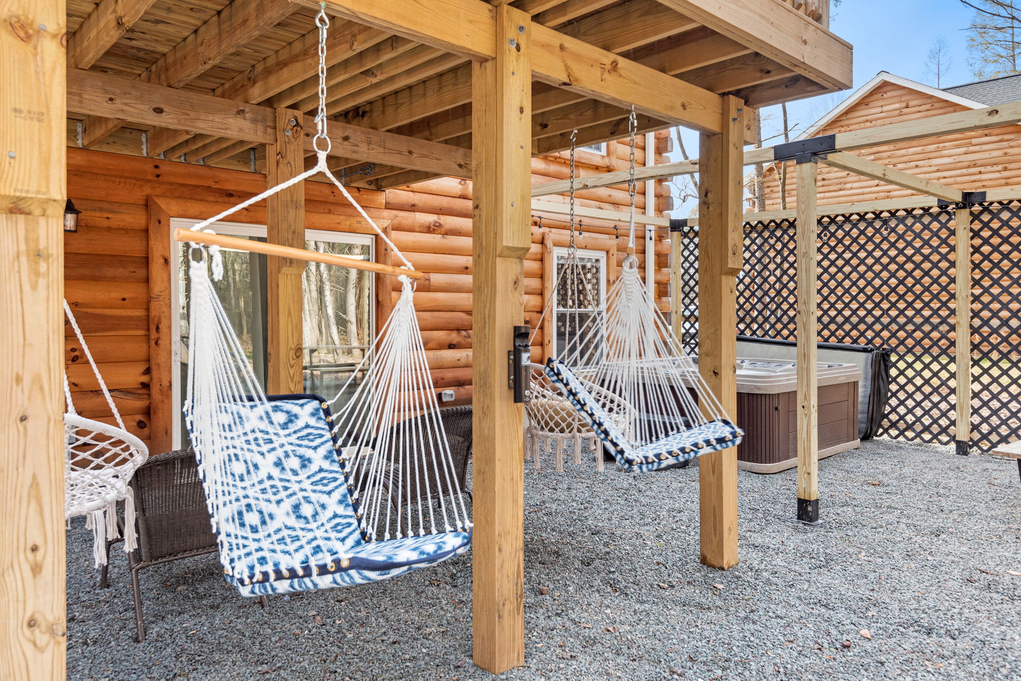 Cozy Hammock Chairs Under the Deck
Swing gently in hanging hammock chairs with a good book or a hot drink this shaded nook is pure cabin calm.