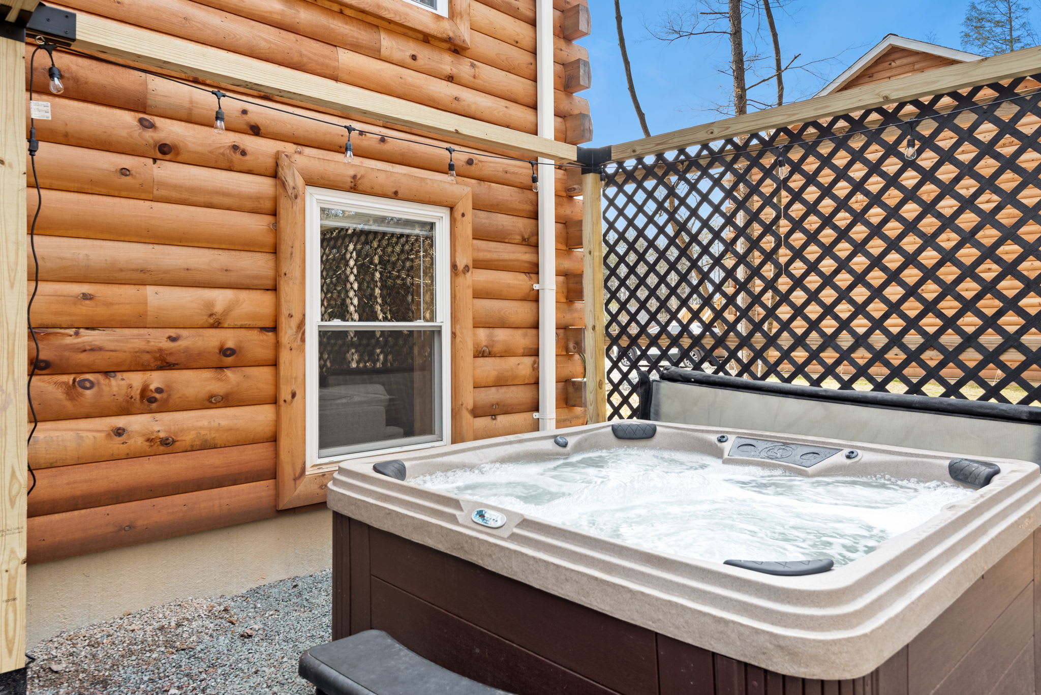 Step out of the cabin and right into your personal spa moment the bubbling hot tub is always ready, no matter the season.