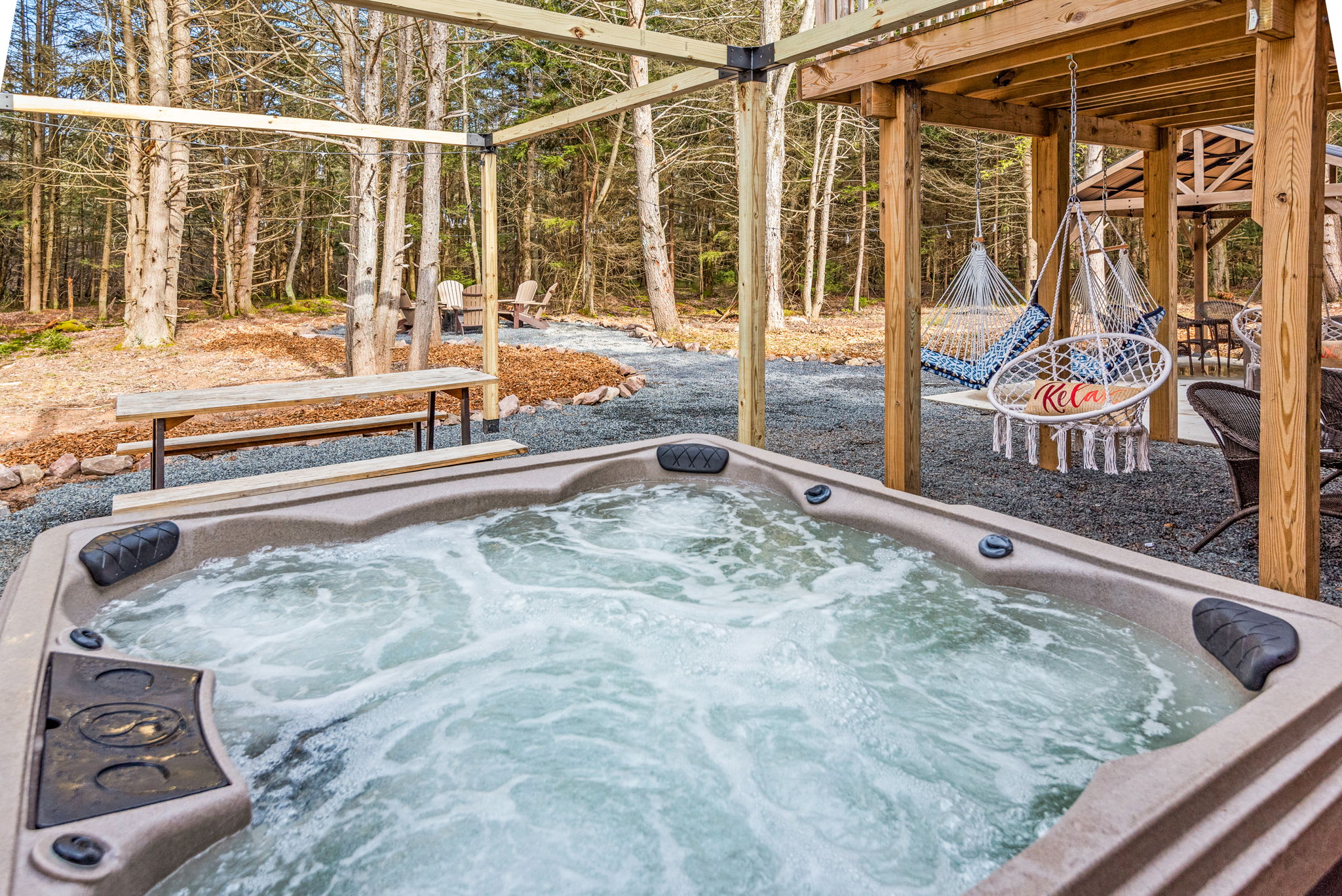 Outdoor Hot Tub & Swing Haven
Soak your cares away in the bubbling hot tub or sway gently on the porch swings, this tucked-away deck is the ultimate relaxation zone.