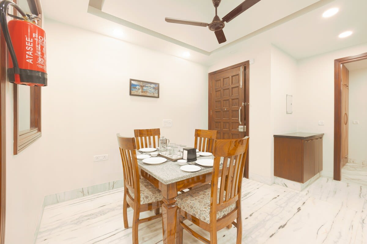 Gather 'round the table and savor the warmth of togetherness in lovely dinning room.