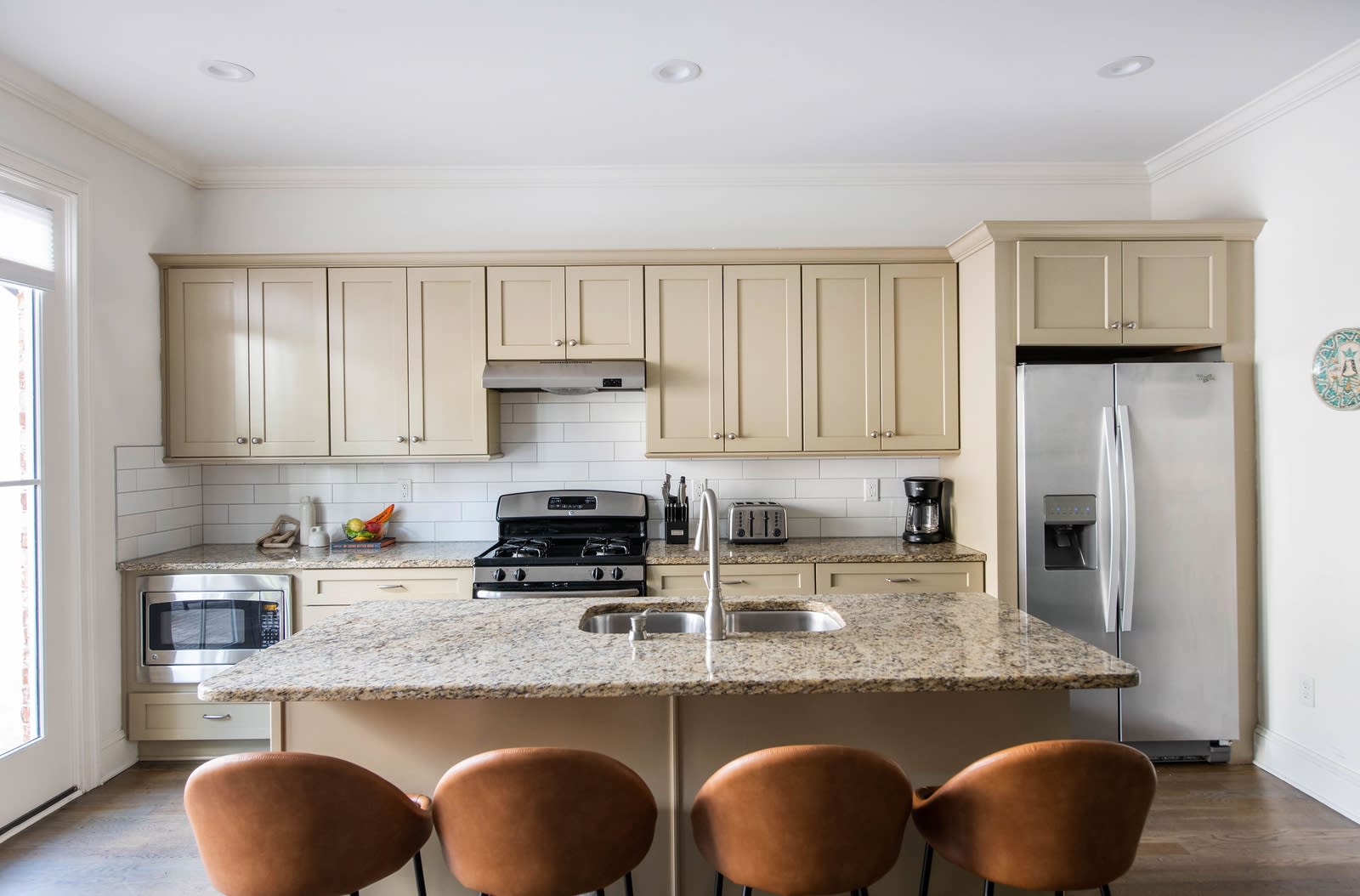 Fully Stocked Kitchen with Island Seating for 4