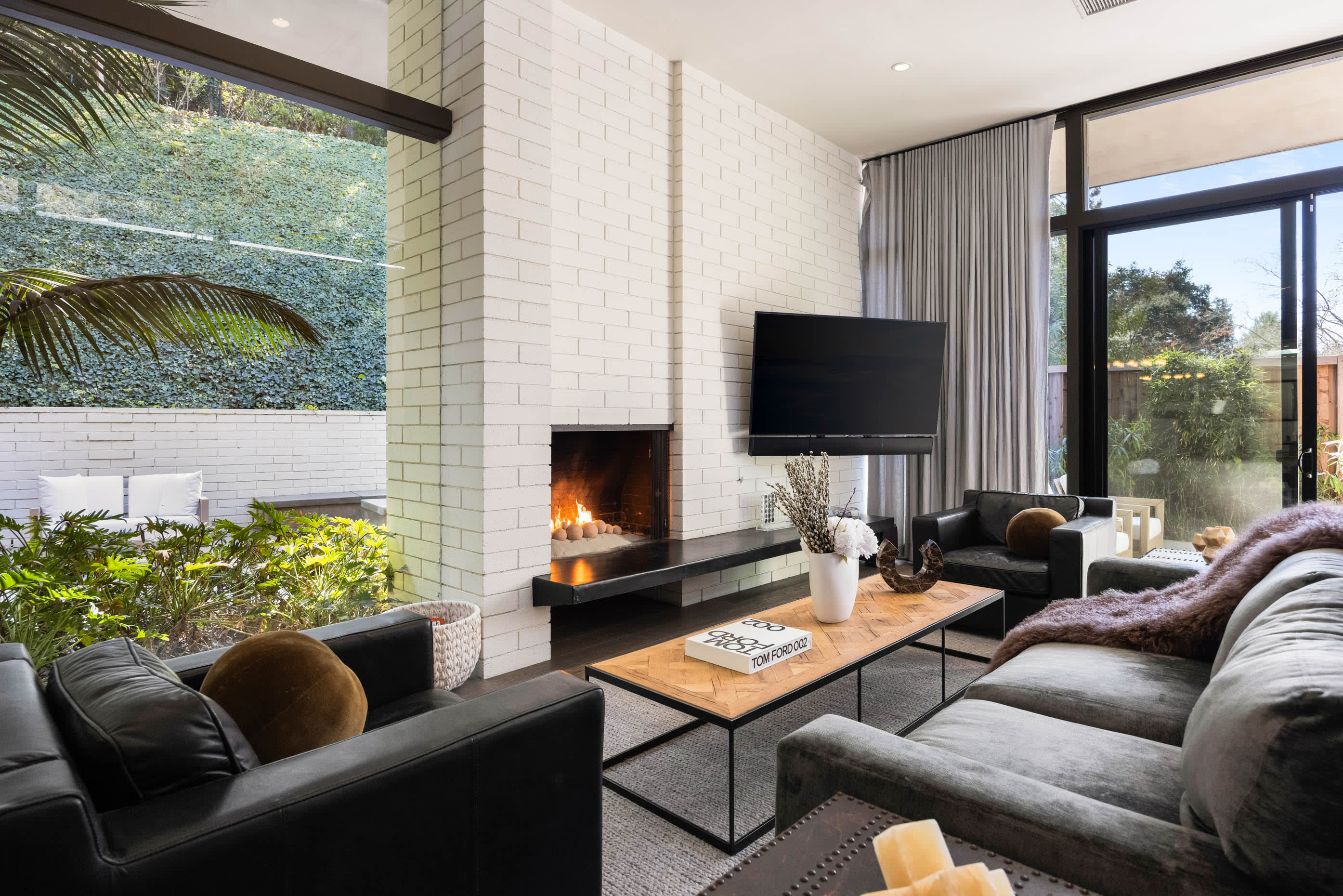 Admire the modern design elements that seamlessly blend sophistication with coziness, making it an ideal retreat.