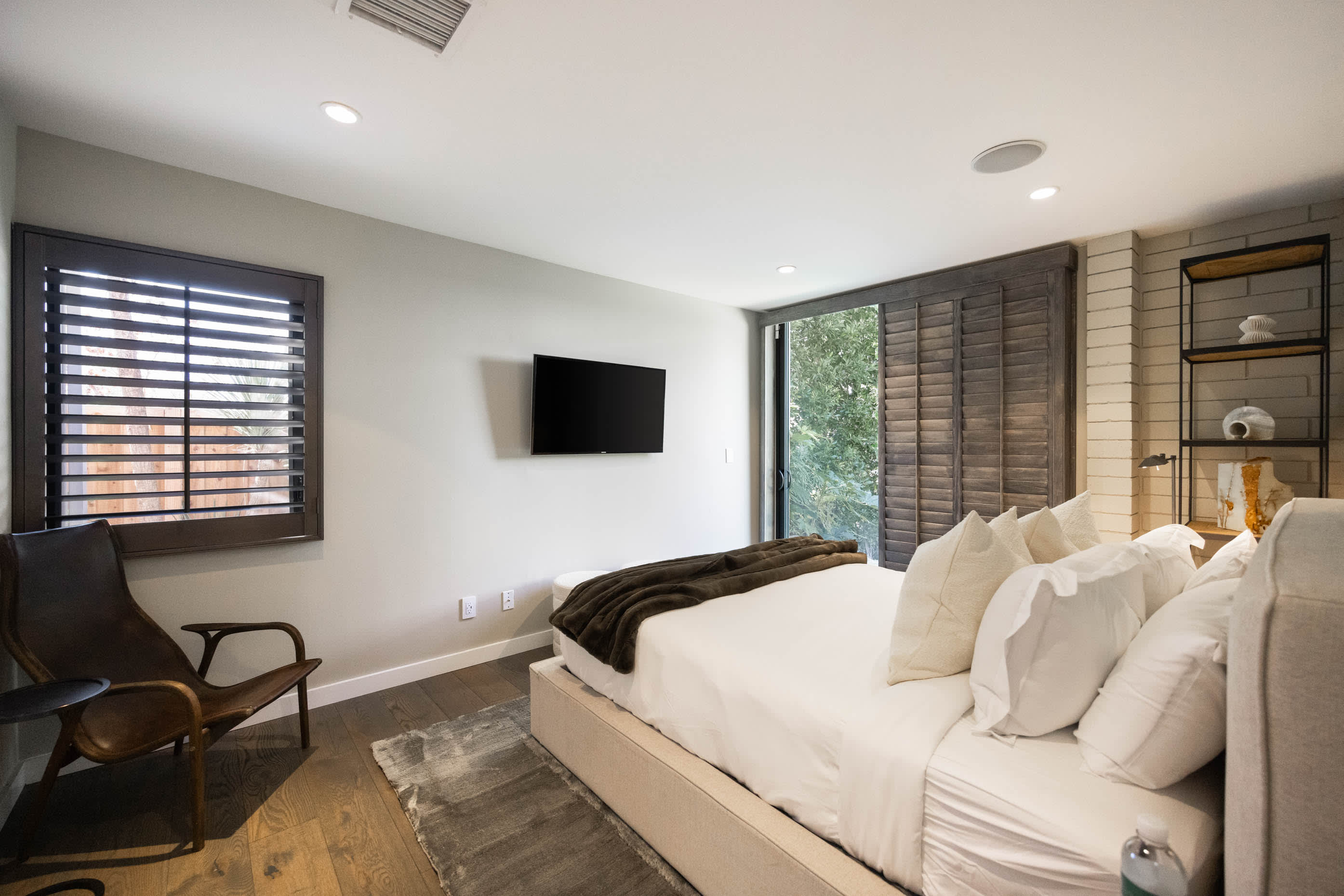 Discover artistic design elements adorning the bedroom.
