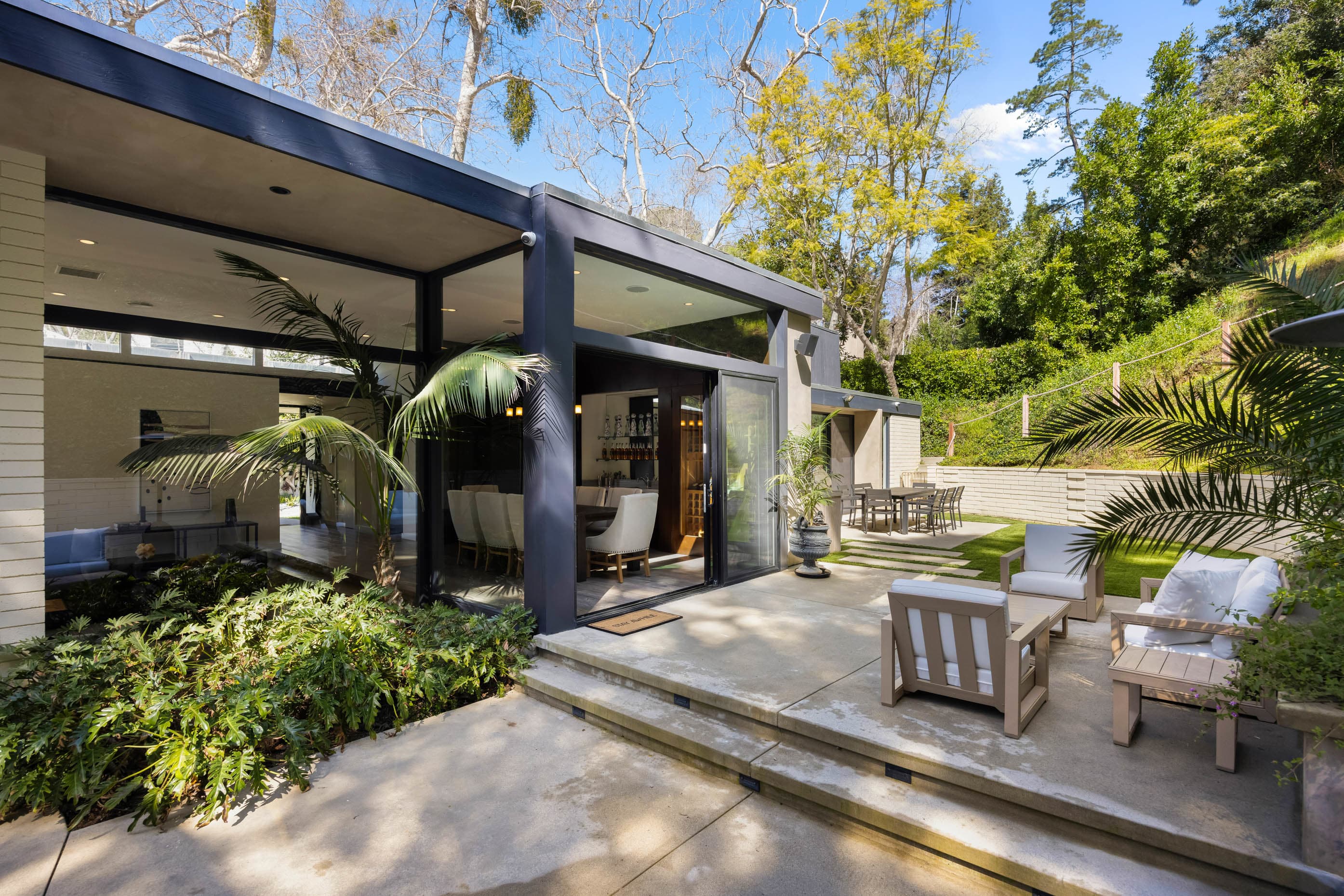Relax in the outdoor seating area, offering comfort and tranquility for unwinding in the fresh air.