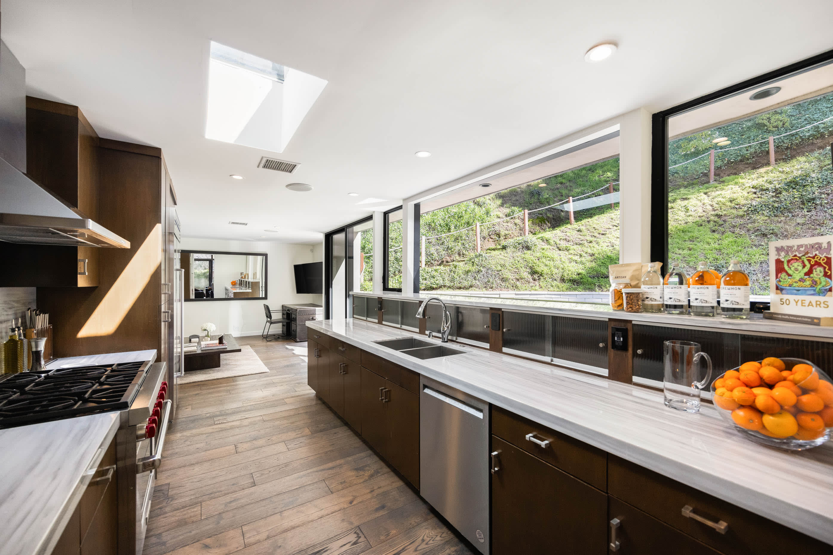 Brighten your culinary endeavors with natural light streaming through the kitchen windows, creating an inspiring atmosphere.