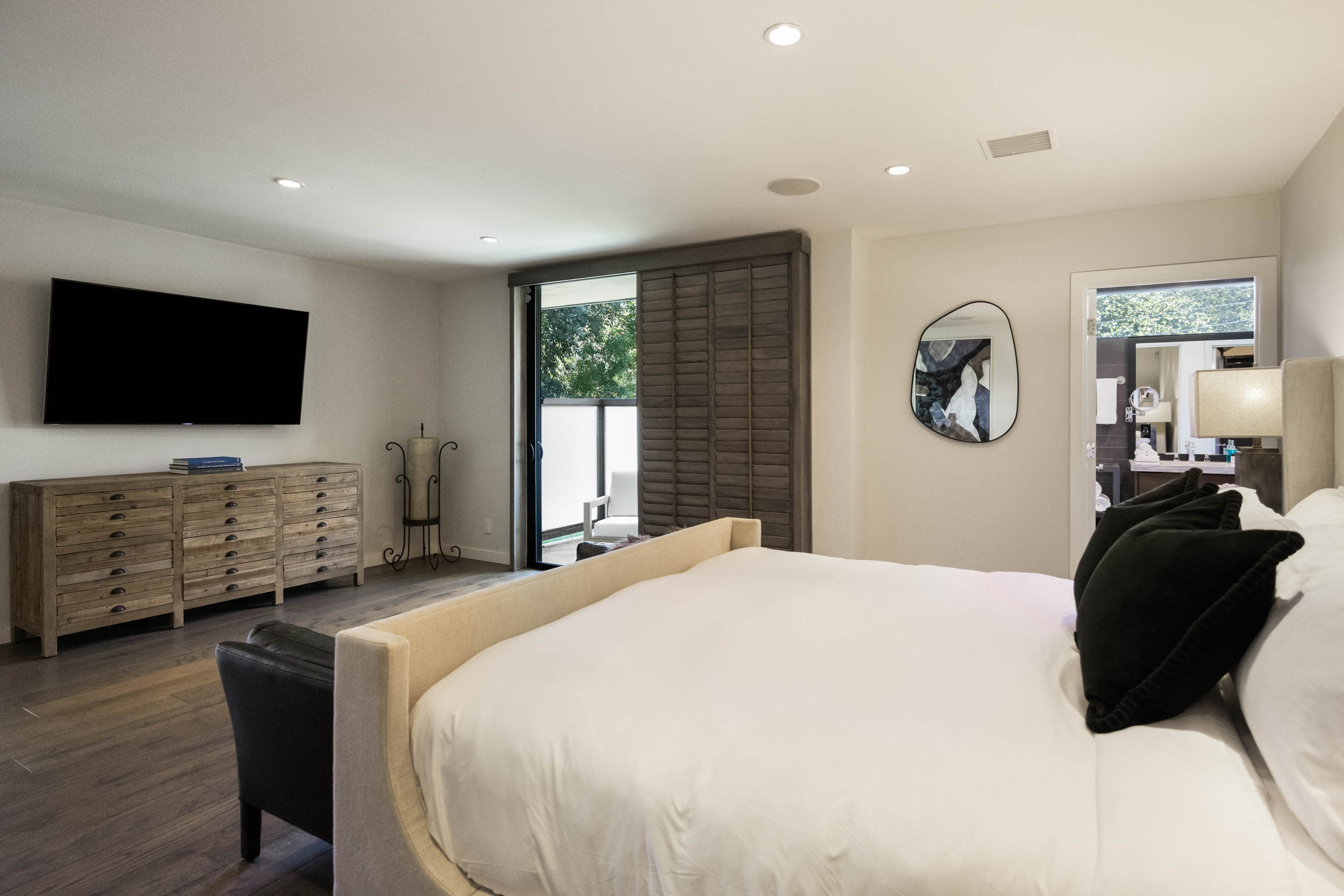 Access to a private balcony overlooking the tranquil grounds.