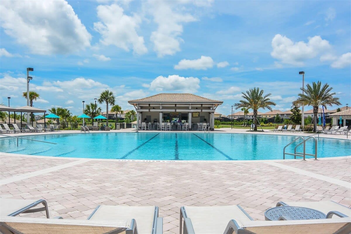 Enjoy a large community pool at the community resort/club house.