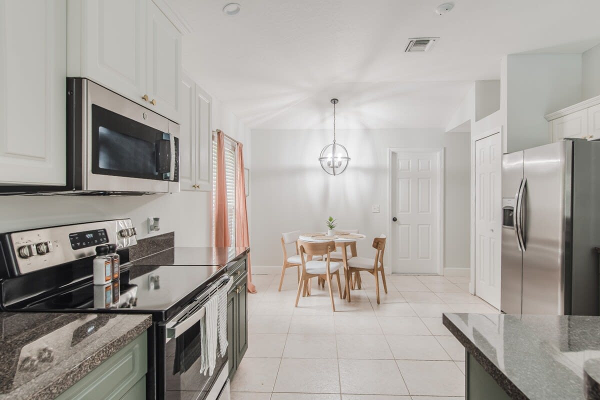 Kitchen is open to the breakfast nook area.