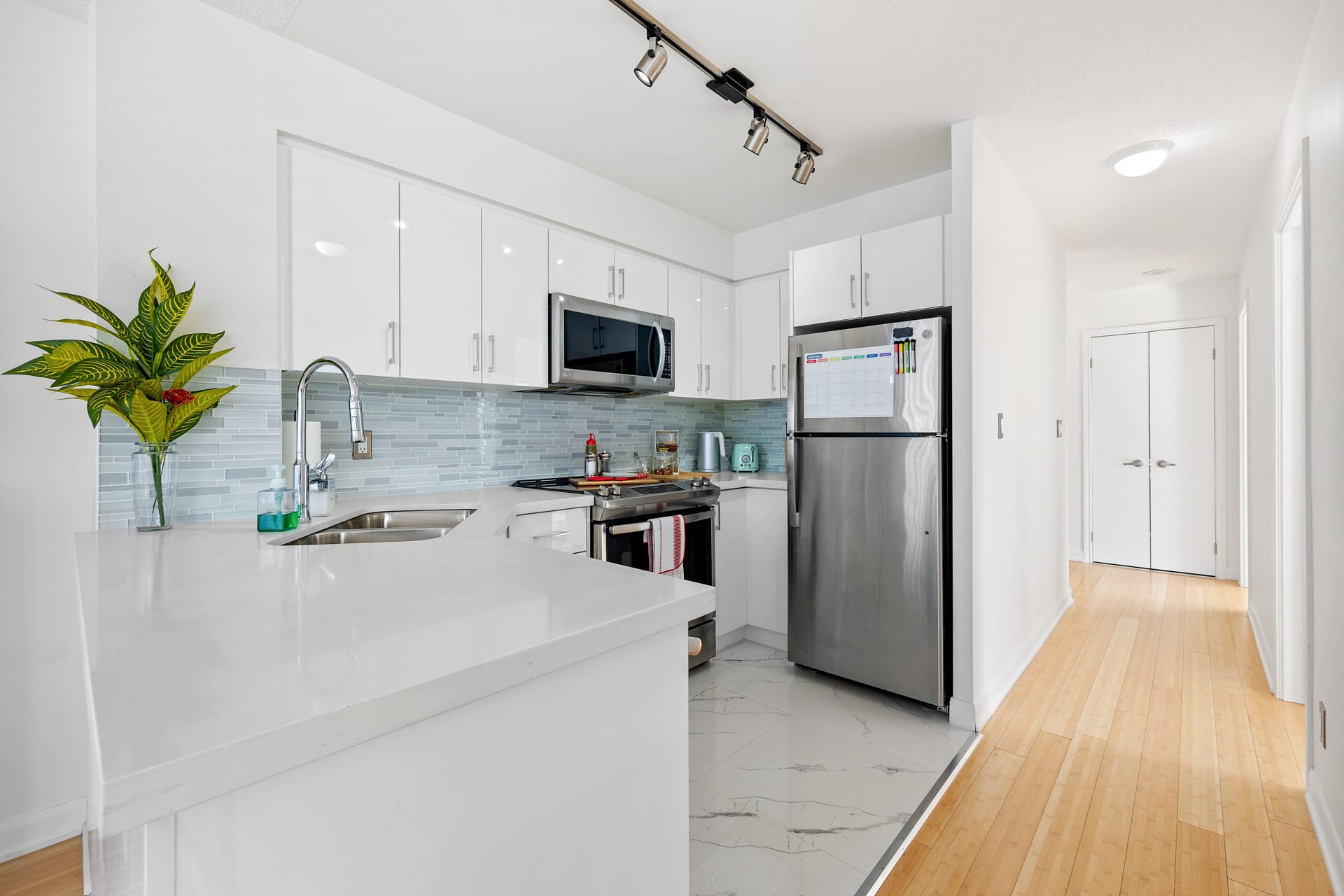 Fully Equipped Kitchen With Sleek Finishes And Top-Of-The-Line Appliances