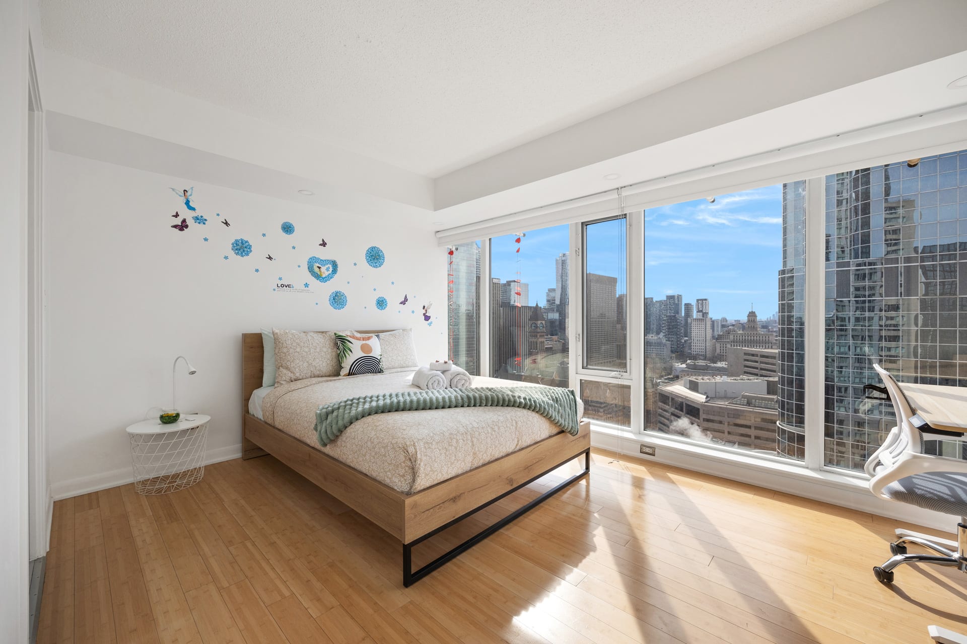 Spacious Queen Bedroom Featuring Scenic Views And Ample Natural Light