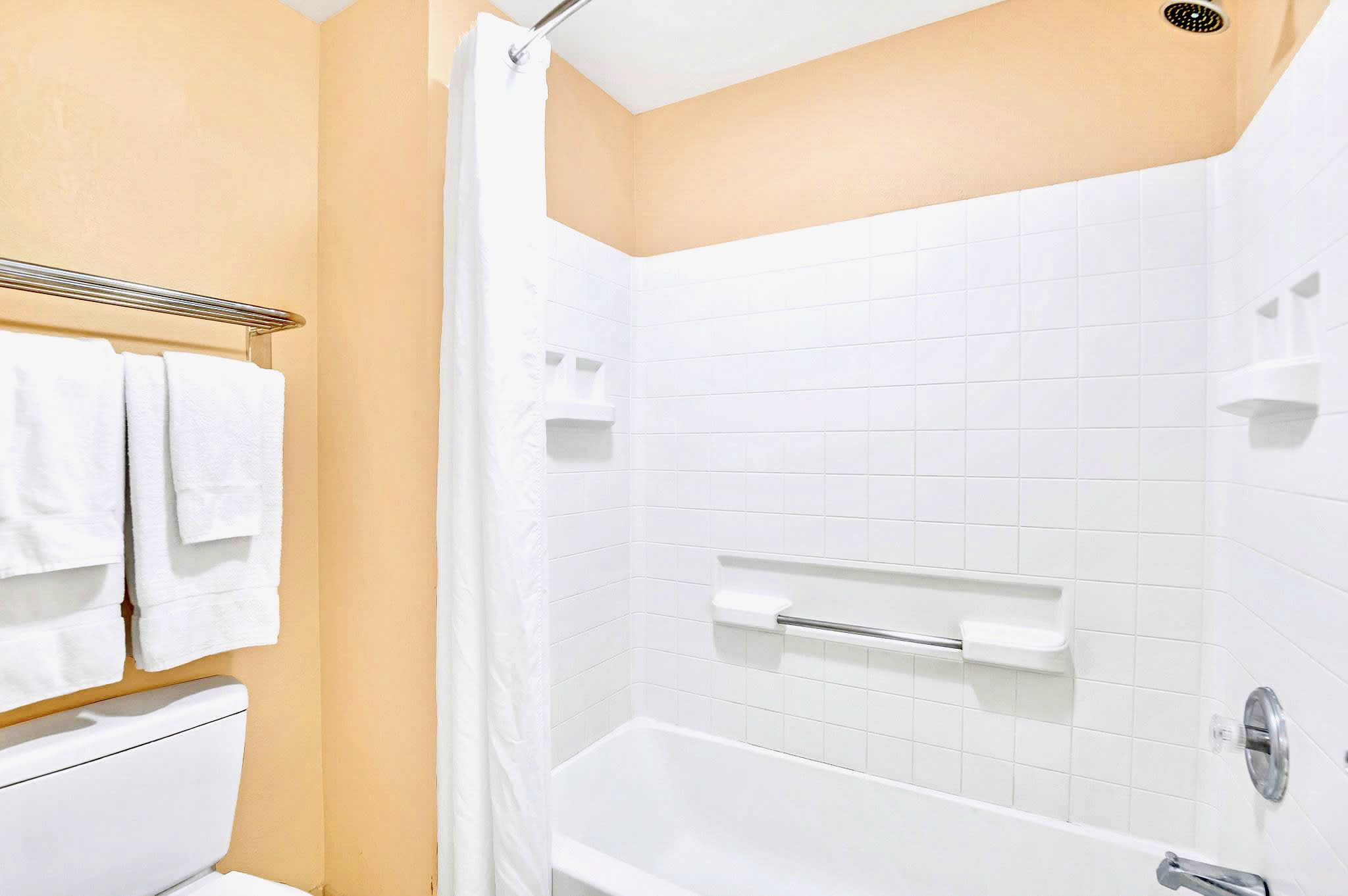 Bathroom with combined bathtub and shower