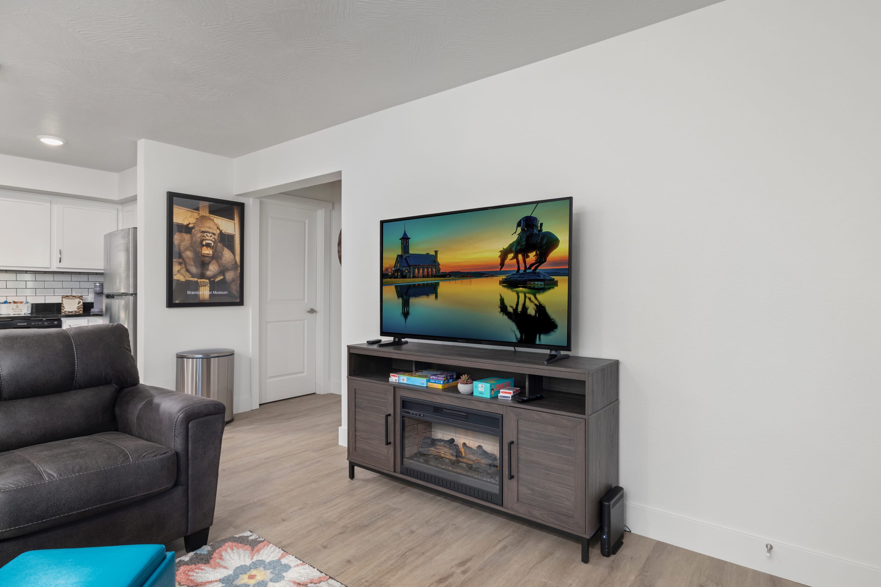 Enjoy the warmth of the electric fireplace while spending time in the living room.