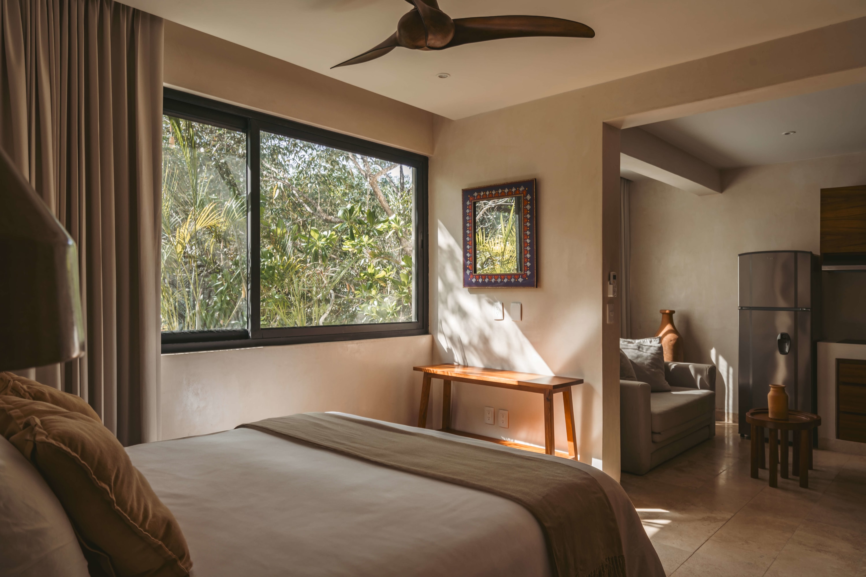 Spacious room with a kitchenette in the adjacent space