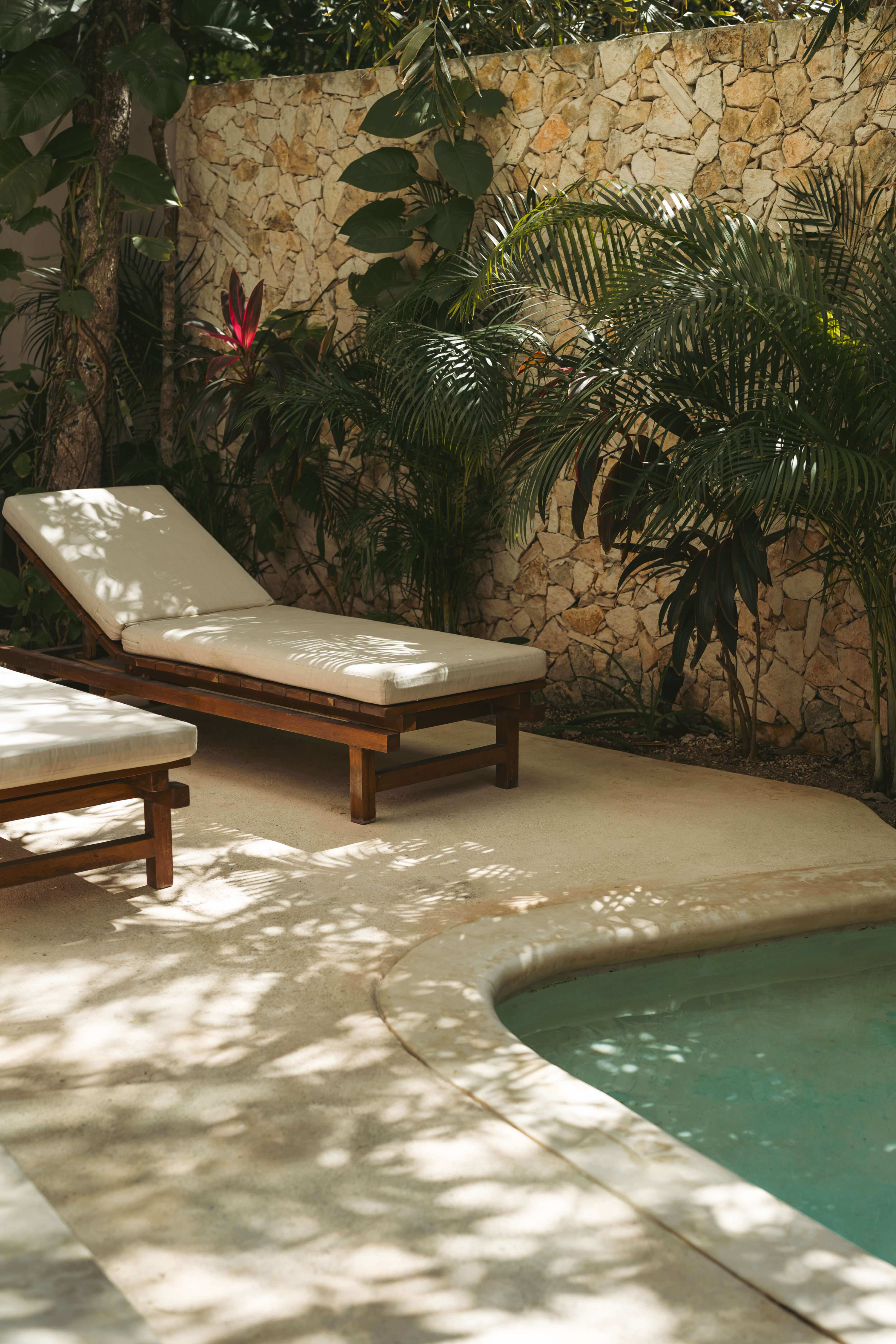 Comfortable loungers located next to the pool