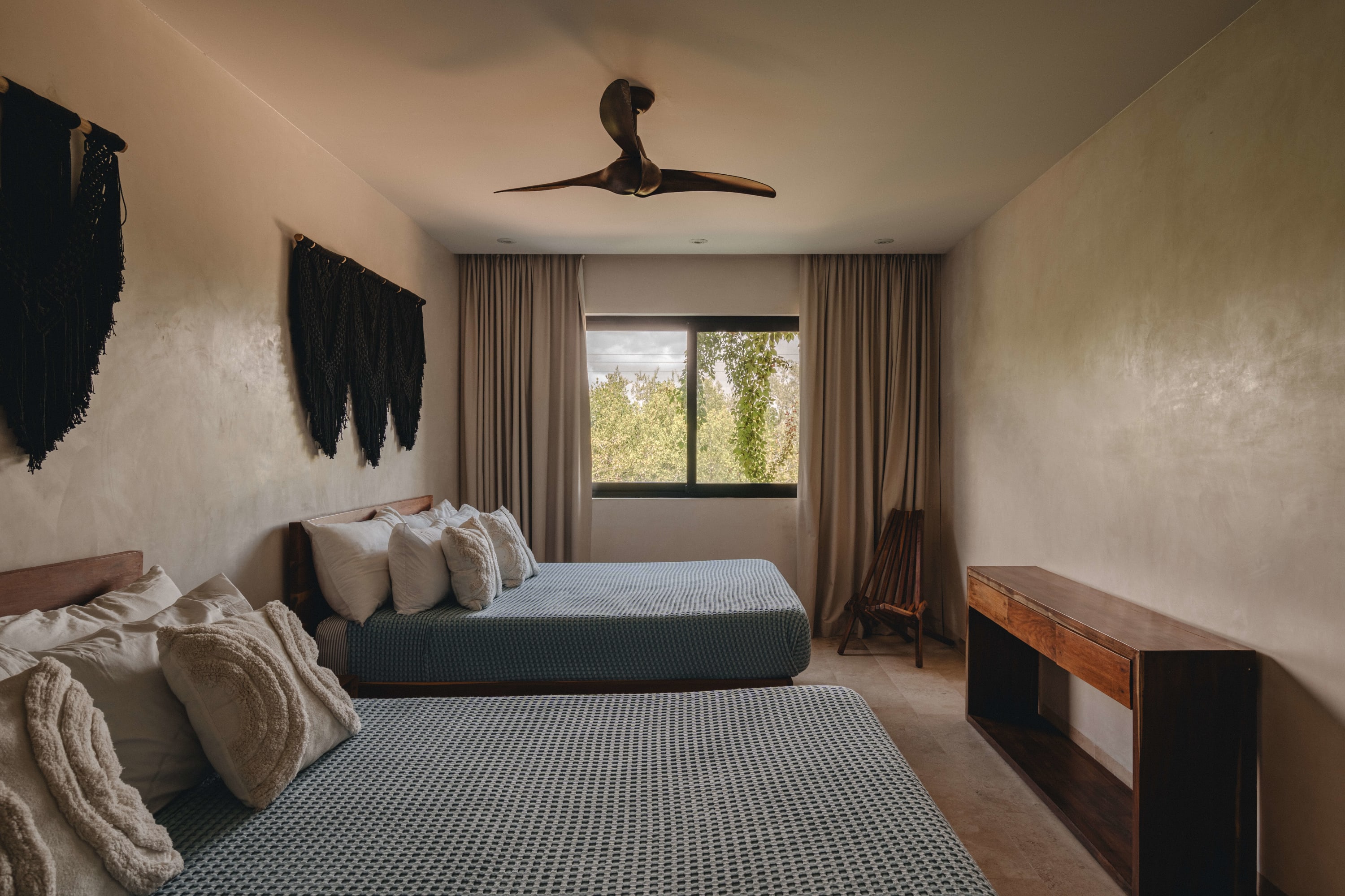 Beautiful bedroom with two comfortable double beds