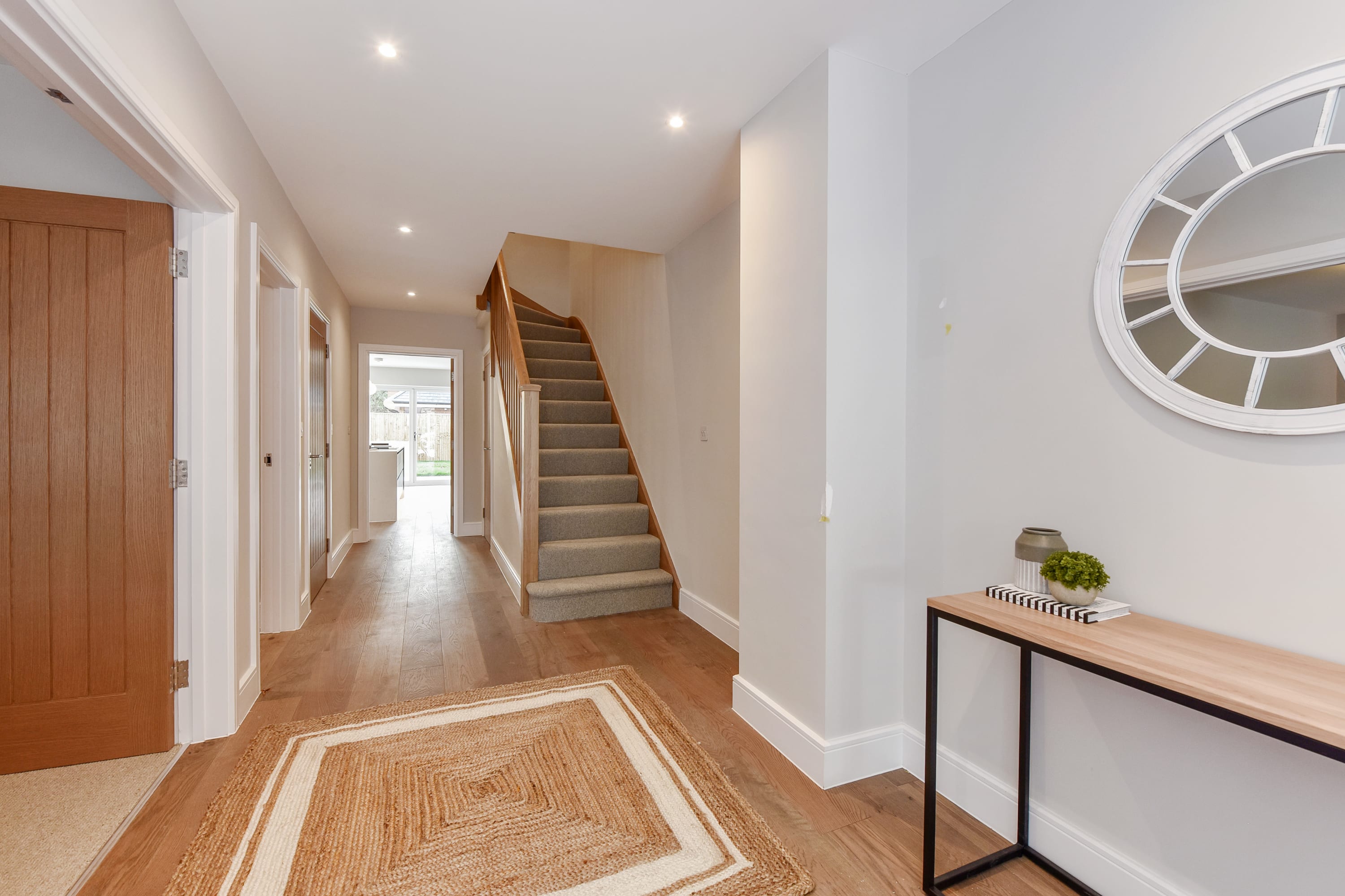 A large light and bright hallway welcomes you as you enter the property.