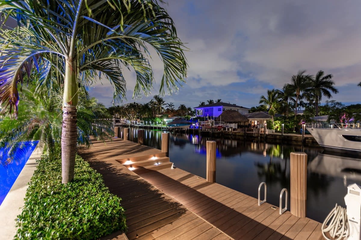 Experience enchanting evenings by the water, with lights casting a magical glow on your private dock.