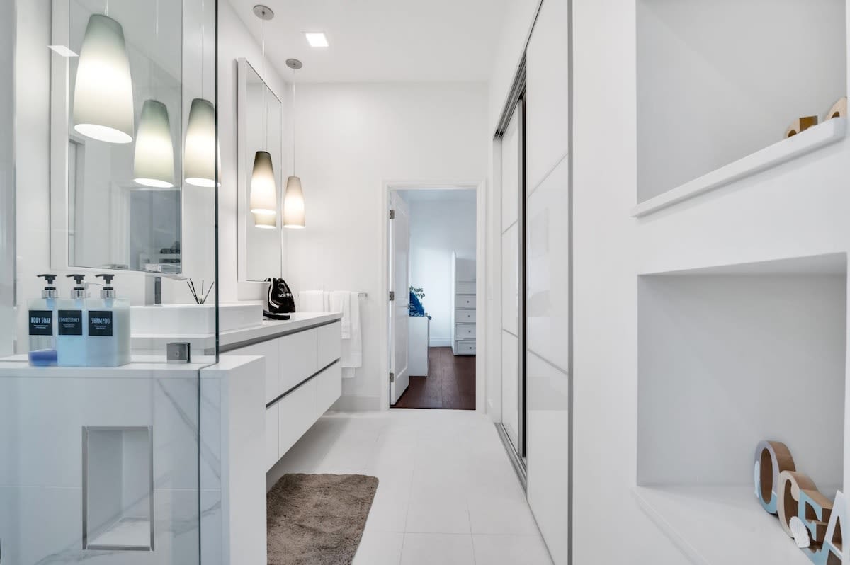 Extra spacious bathroom with new details.