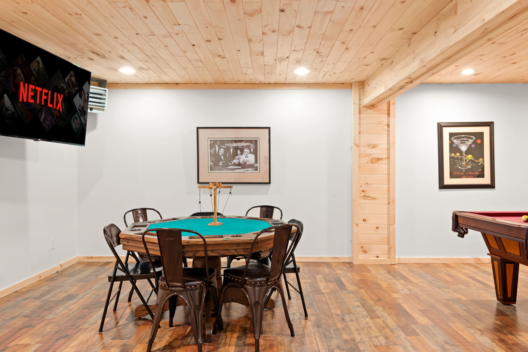 The pool table and poker setup offer the best of both worlds, leisurely games and lively conversations.