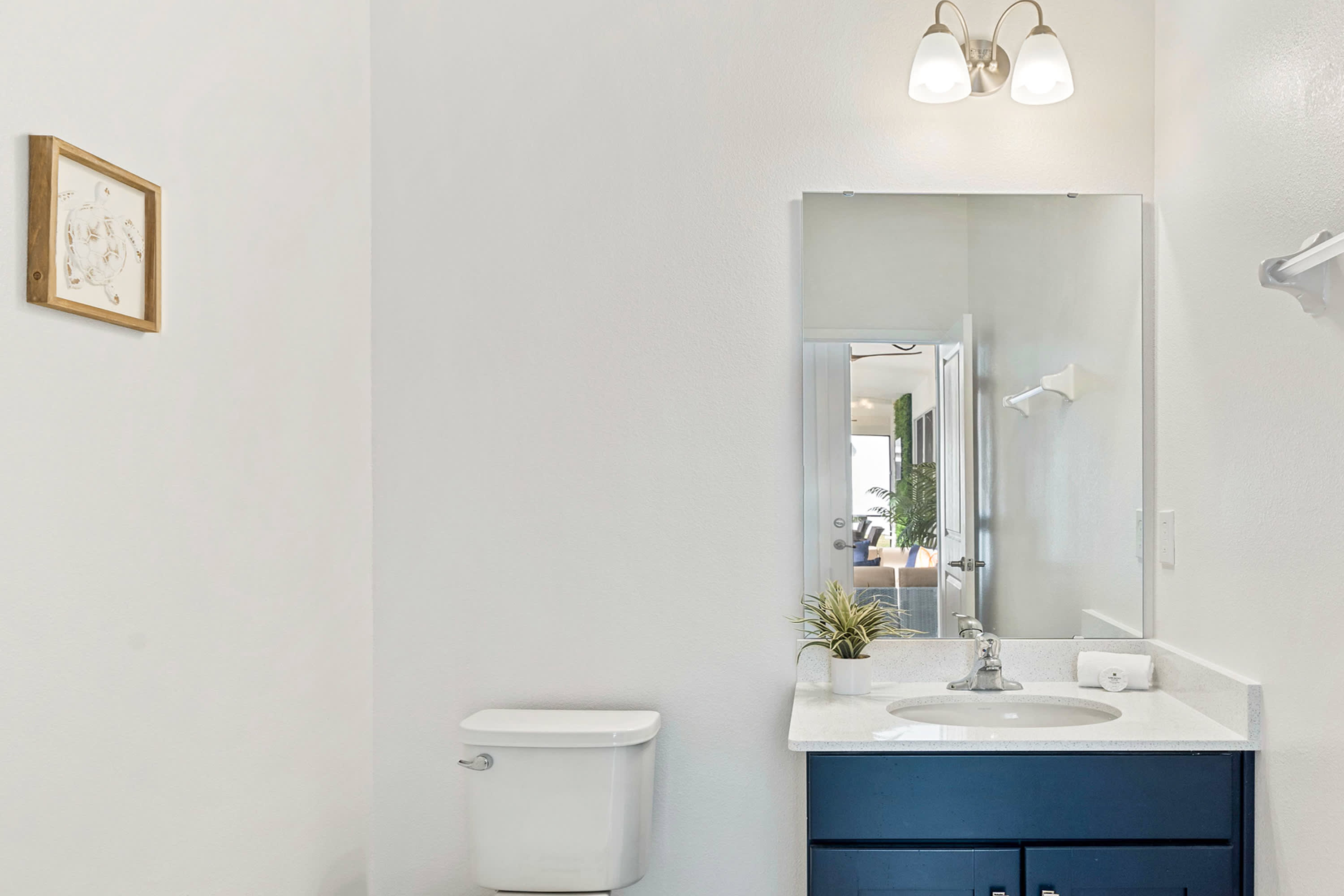 Bright Bathroom With A Clean Design And Elegant Vanity