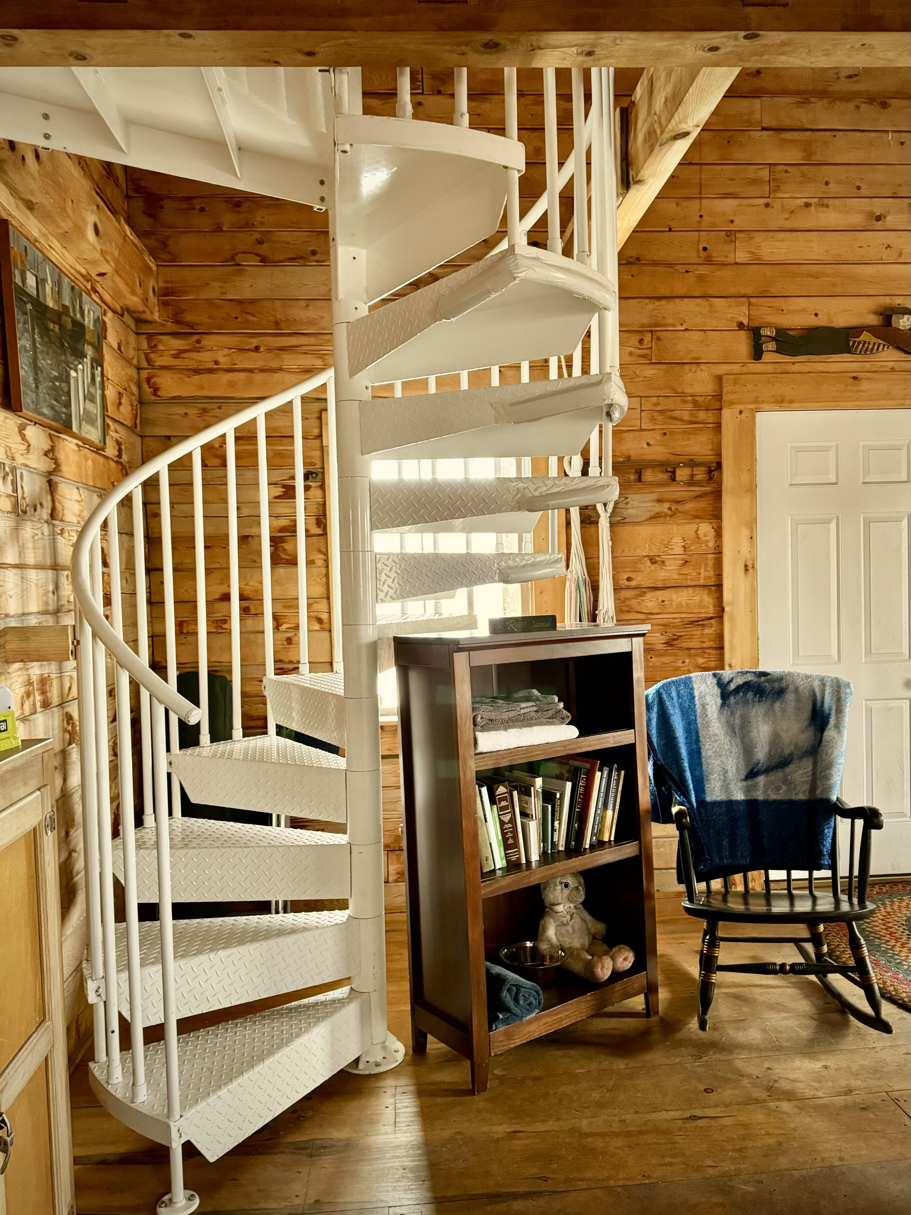 Upstairs to the sleeping loft.