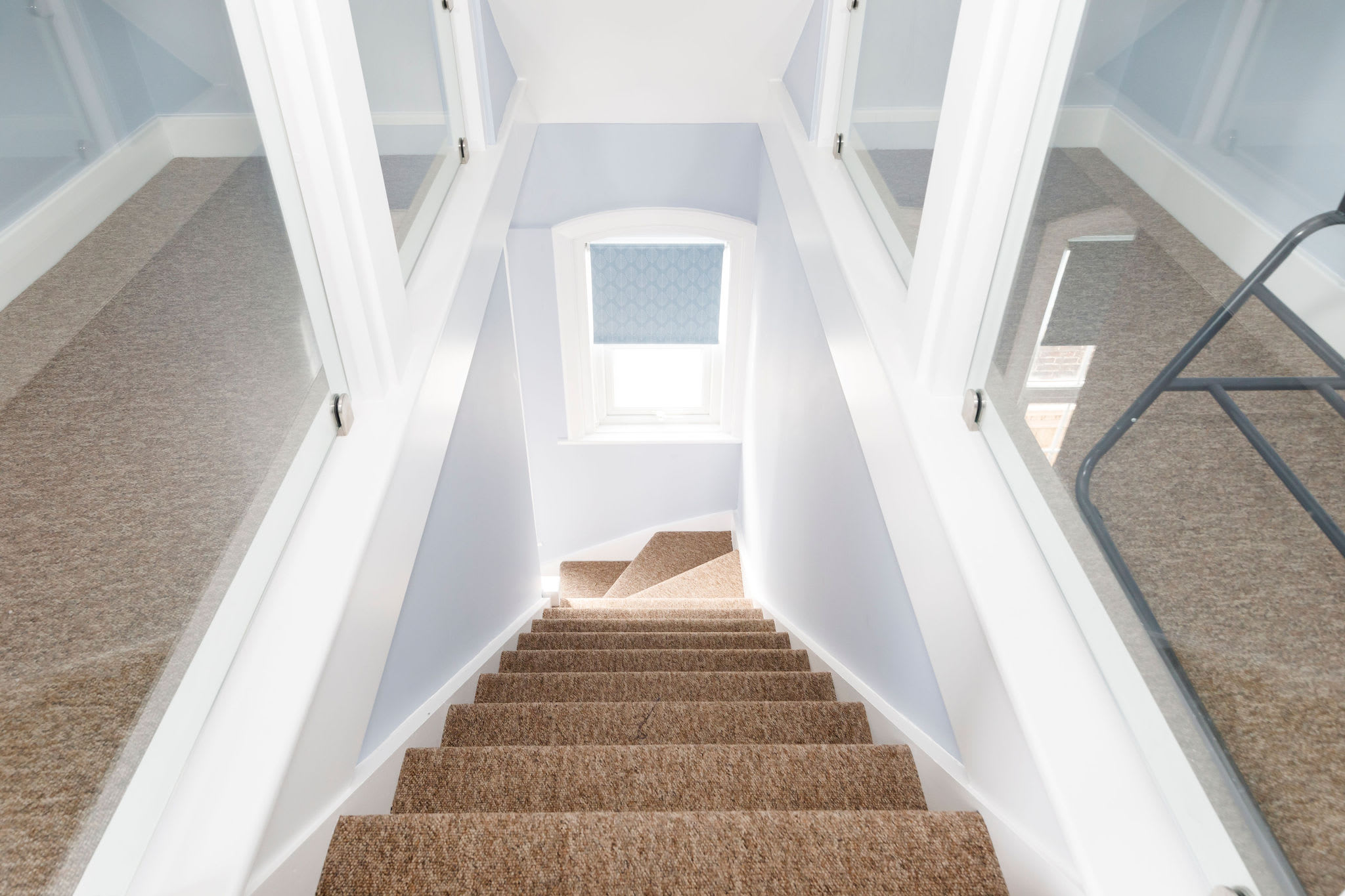 Stairs up to the master bedroom