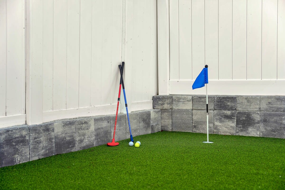 Putting green with adjustable putters so everyone can play!