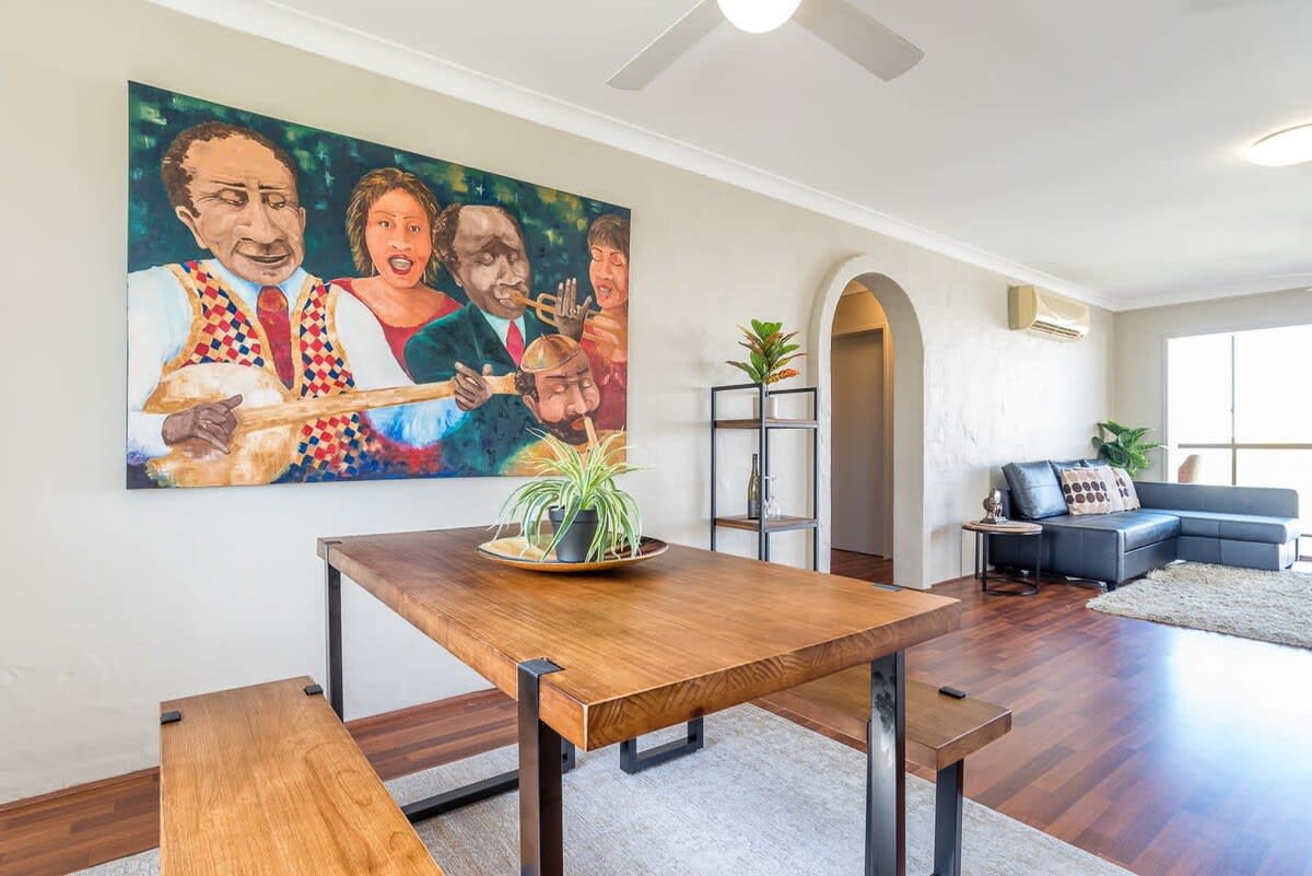 Connected to the living area and kitchen, you'll find a dining area which accommodates 4 guests