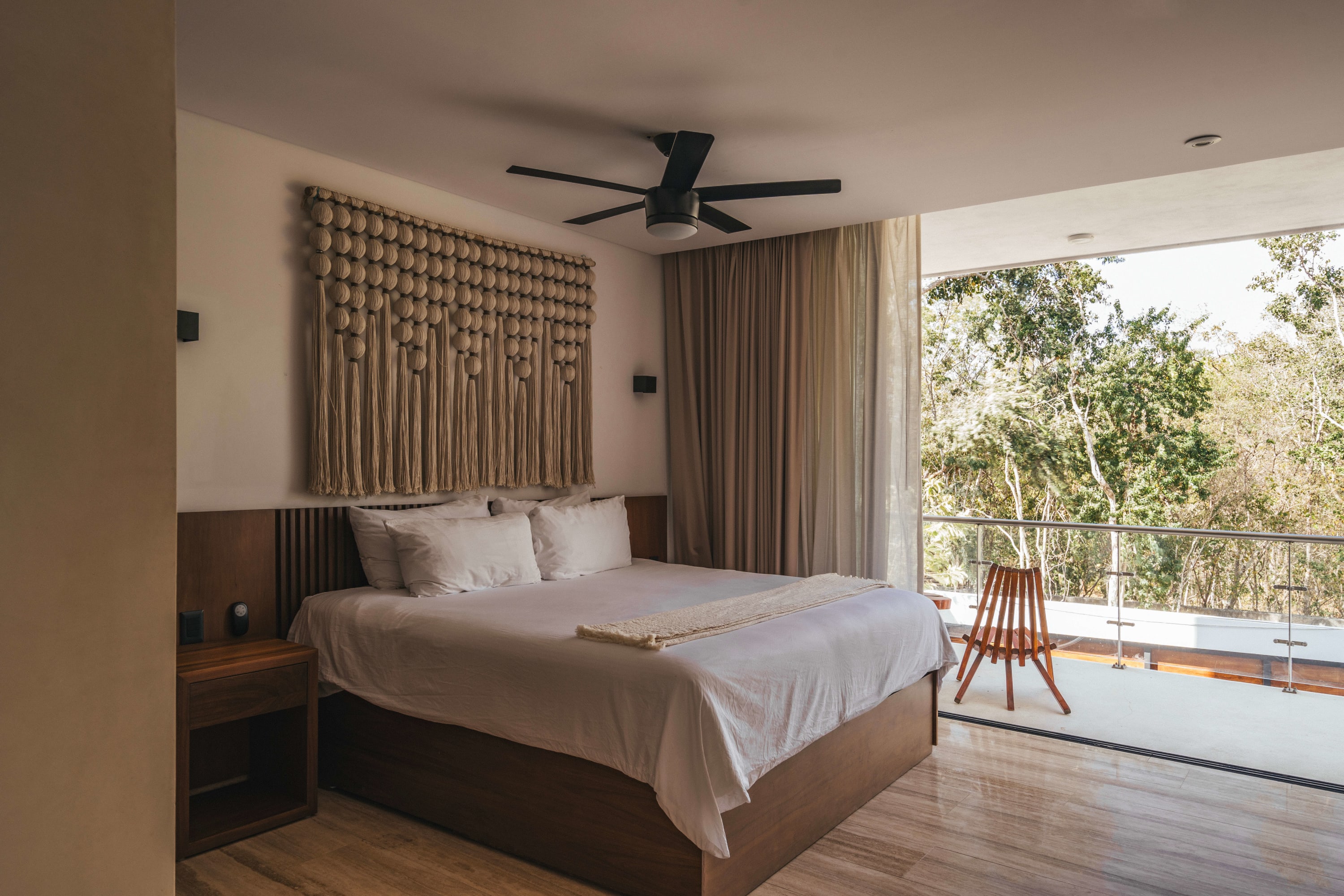 Spacious and bright bedroom with a king-size bed.Spacious and bright bedroom with a king-size bed.