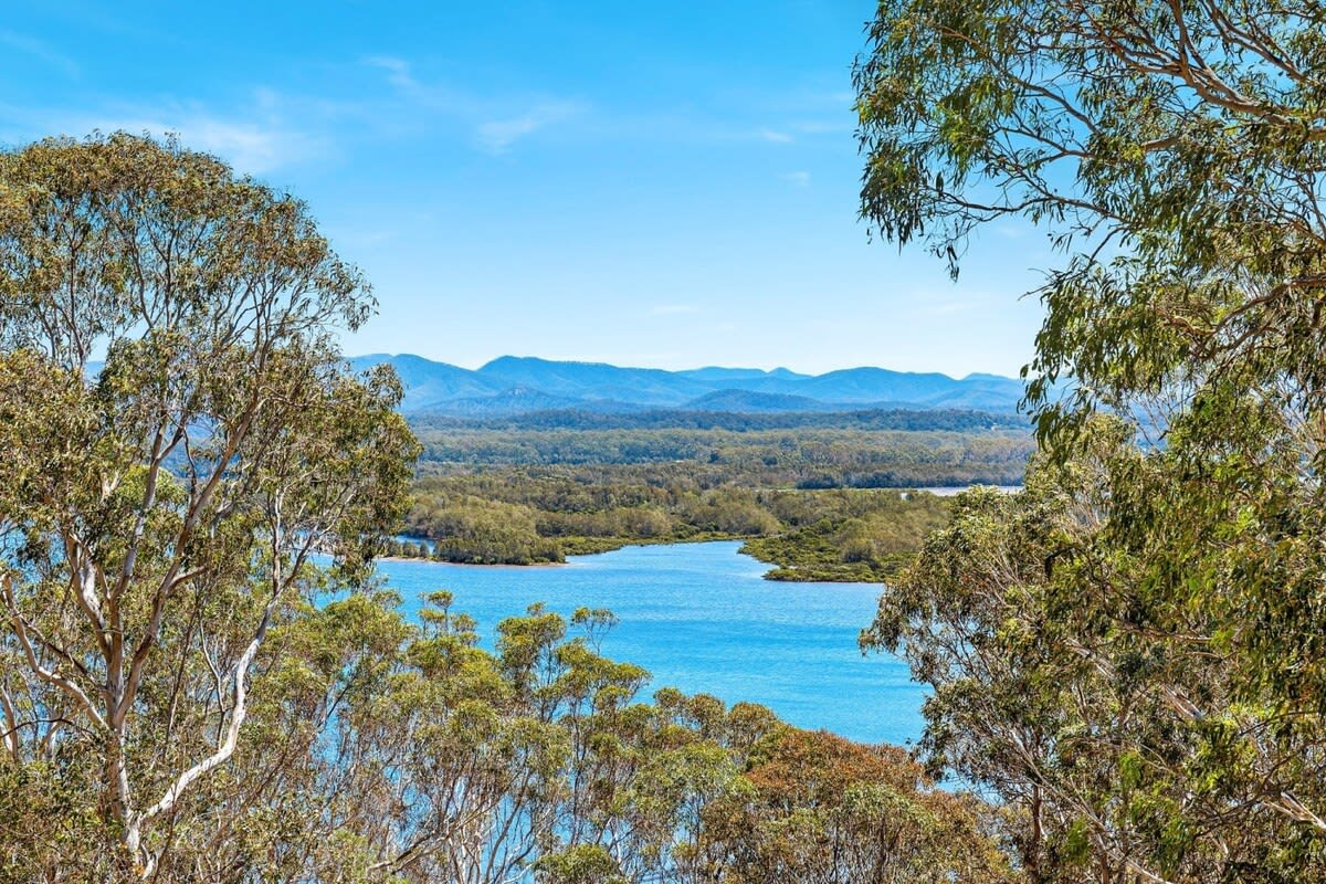 View across Tuross Lake towards the forested hinterland