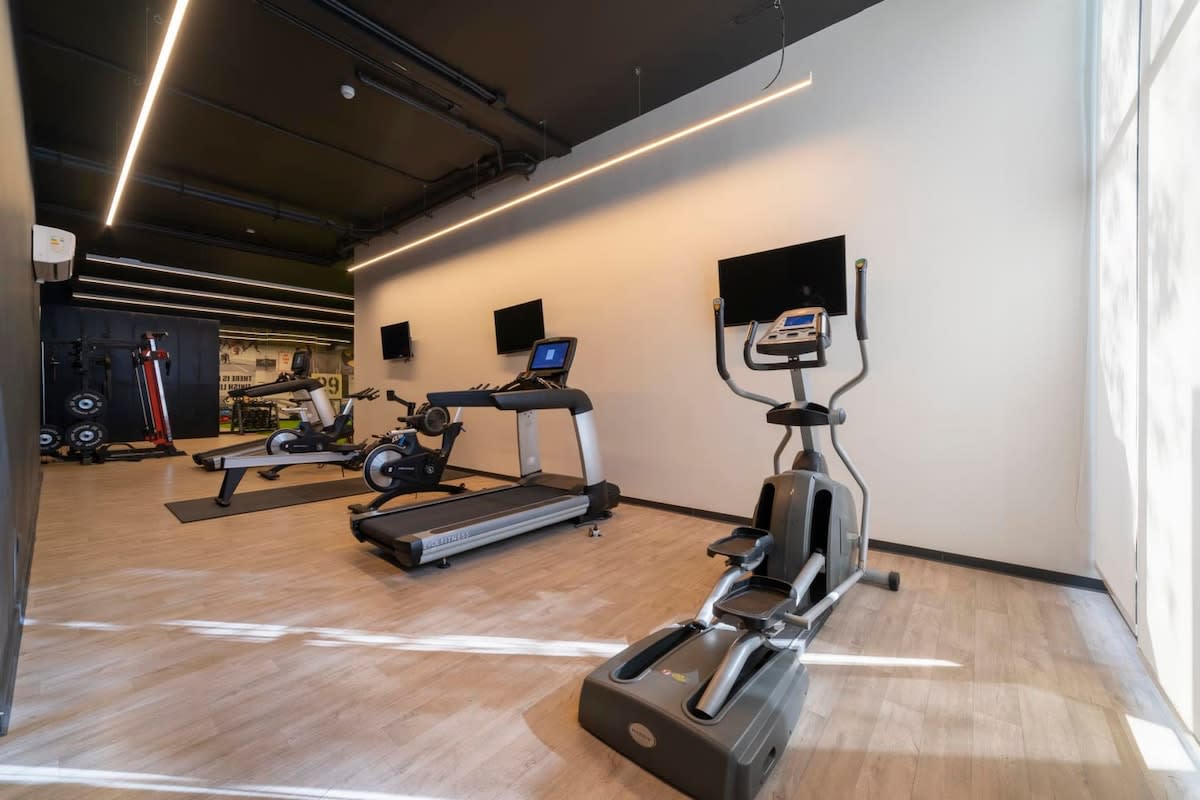Stay fit during your stay with access to a modern gym equipped with top-notch exercise machines.