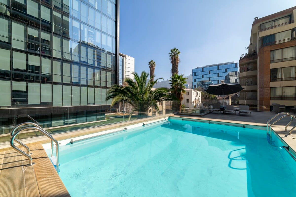 Enjoy a refreshing swim in this stunning pool with city views, perfect for unwinding after a day of exploring.