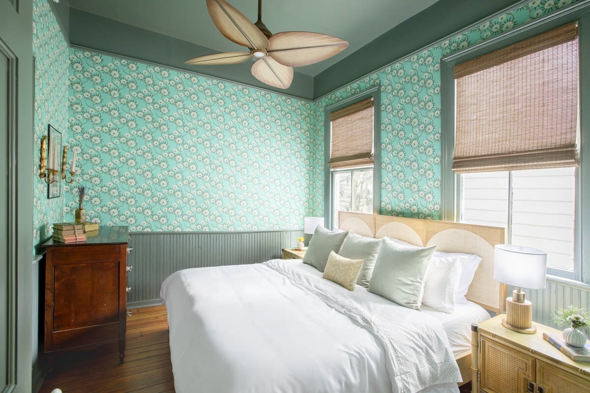 Welcome to your downtown Charleston rental! Bedroom #1 with King Bed + TV + Ceiling Fan