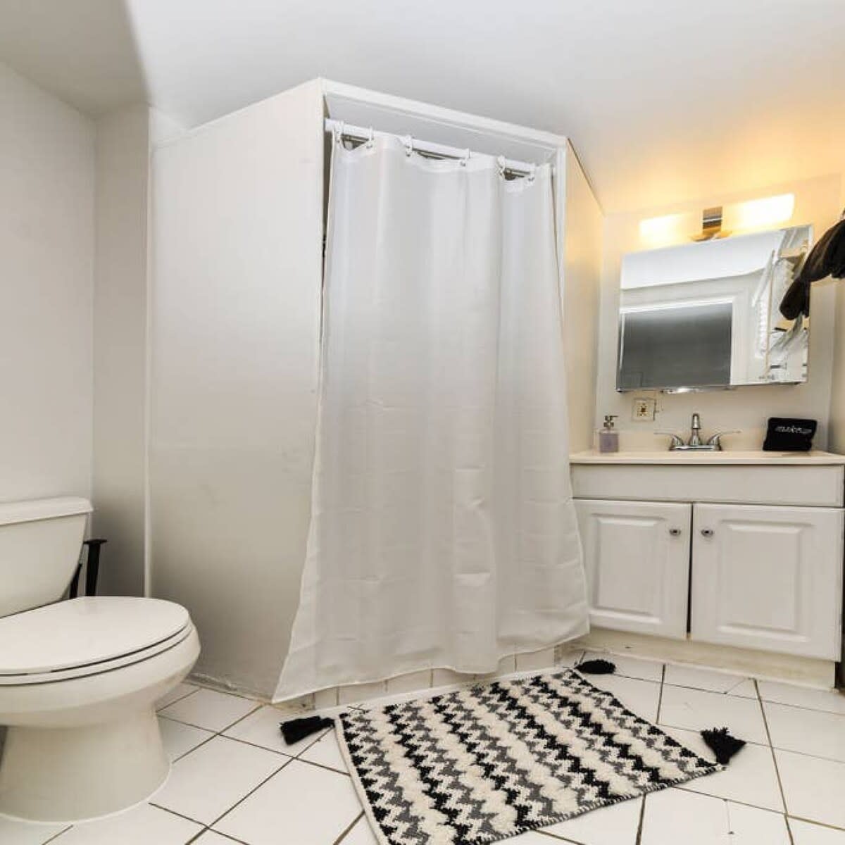 Full bathroom with a walk-in shower!