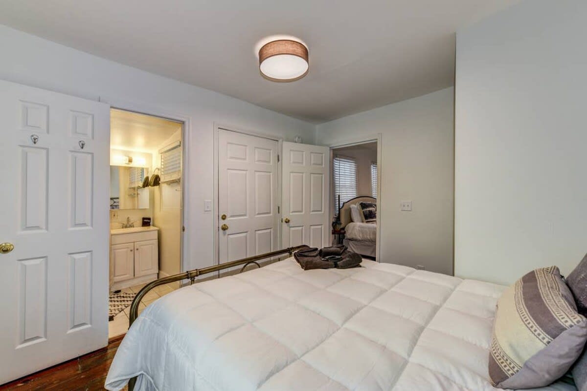 Bedroom #4 located on the second floor with a queen bed and ensuite!