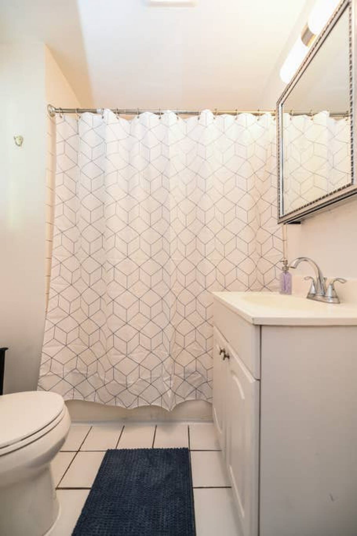 Full bathroom with shower/tub combo!