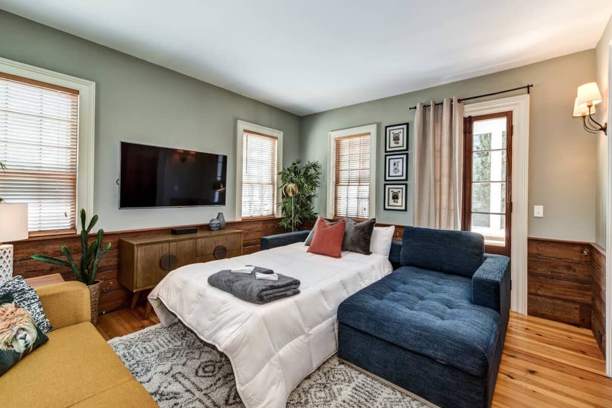 The third bedroom/living room has historic pocket doors to become a private room!