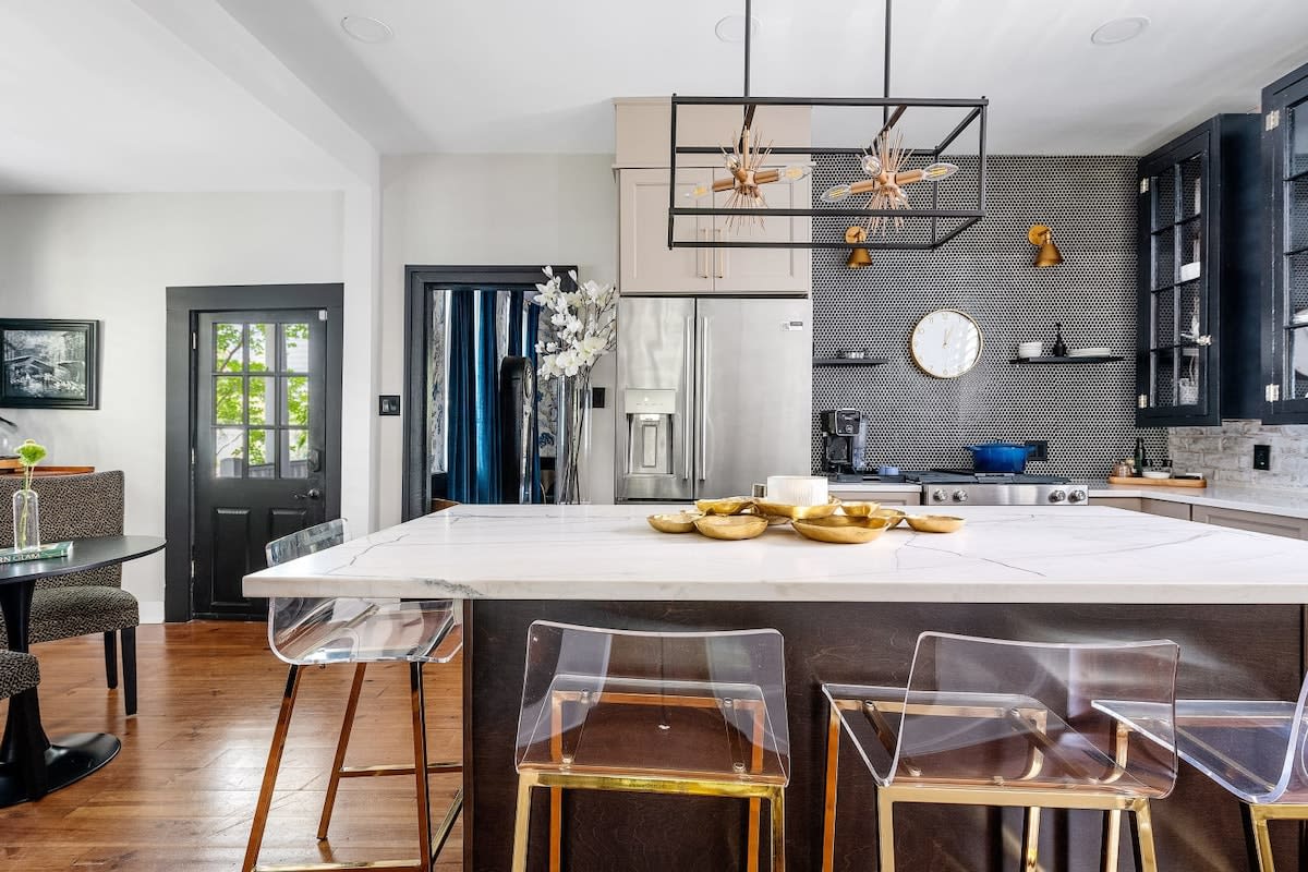 Kitchen with island seating and a bistro table set