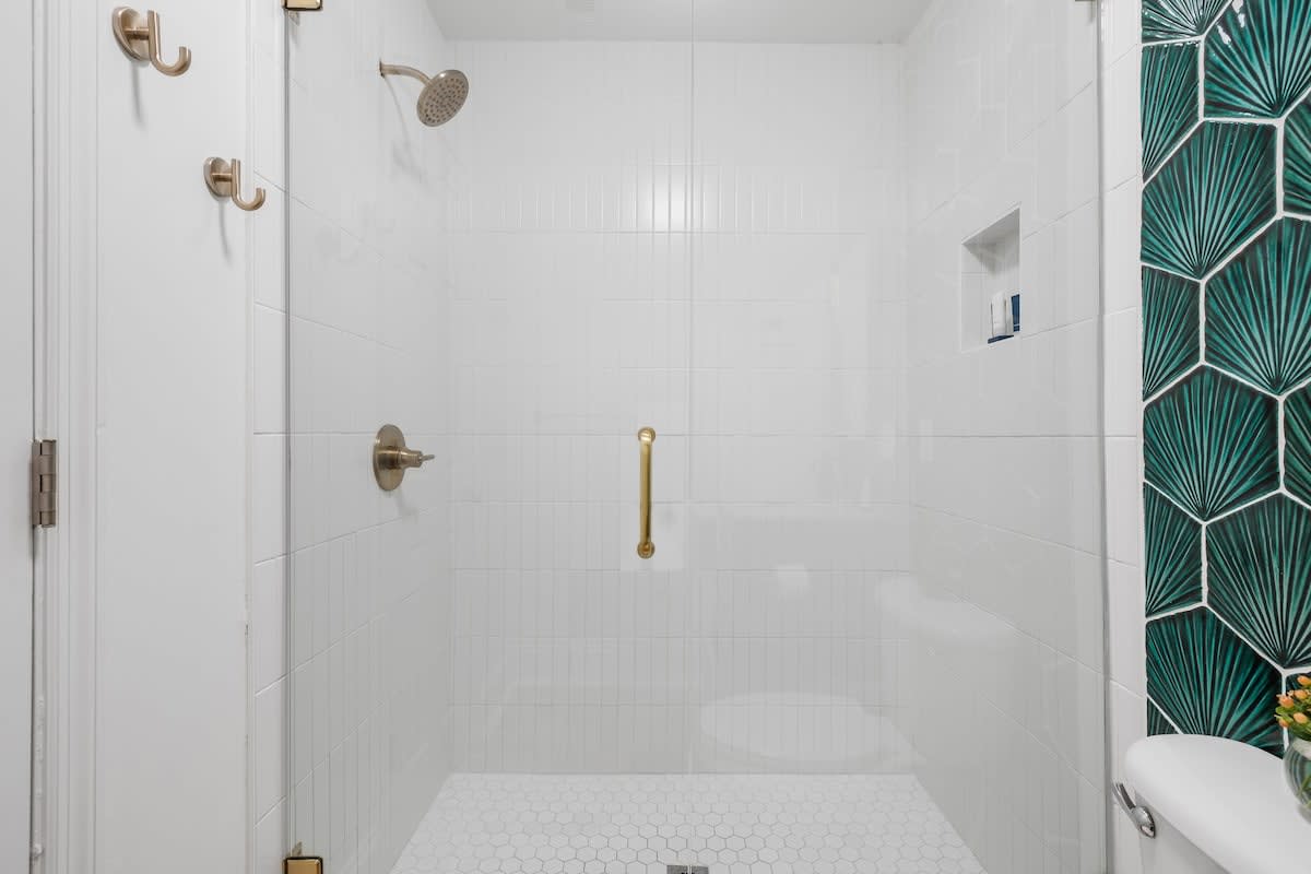 Full bathroom with a walk-in shower 