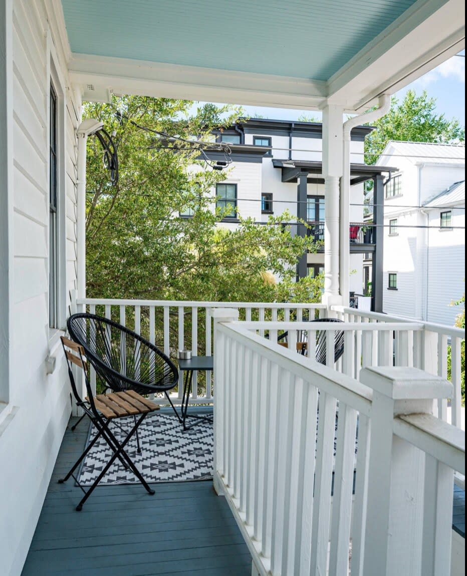 Outdoor porch area with seating to enjoy our wonderful weather!