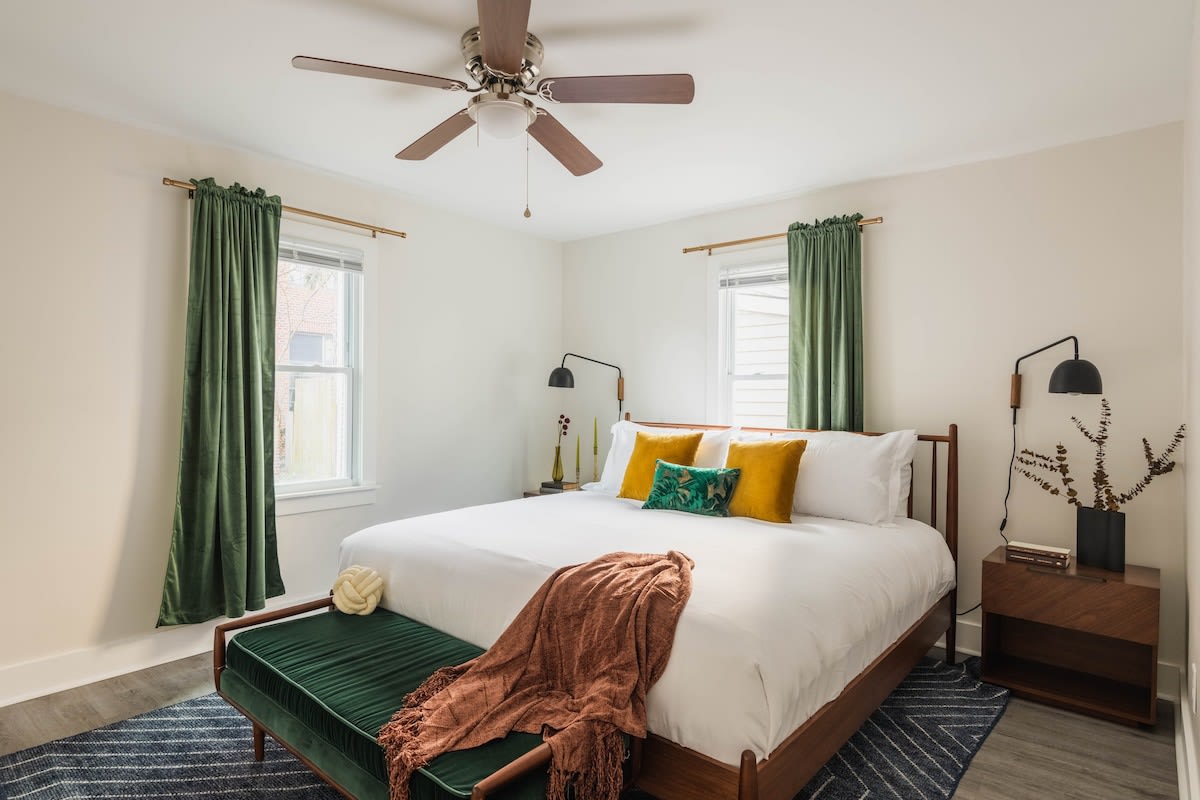 Bedroom #1 with a King Bed + TV + Ceiling Fan