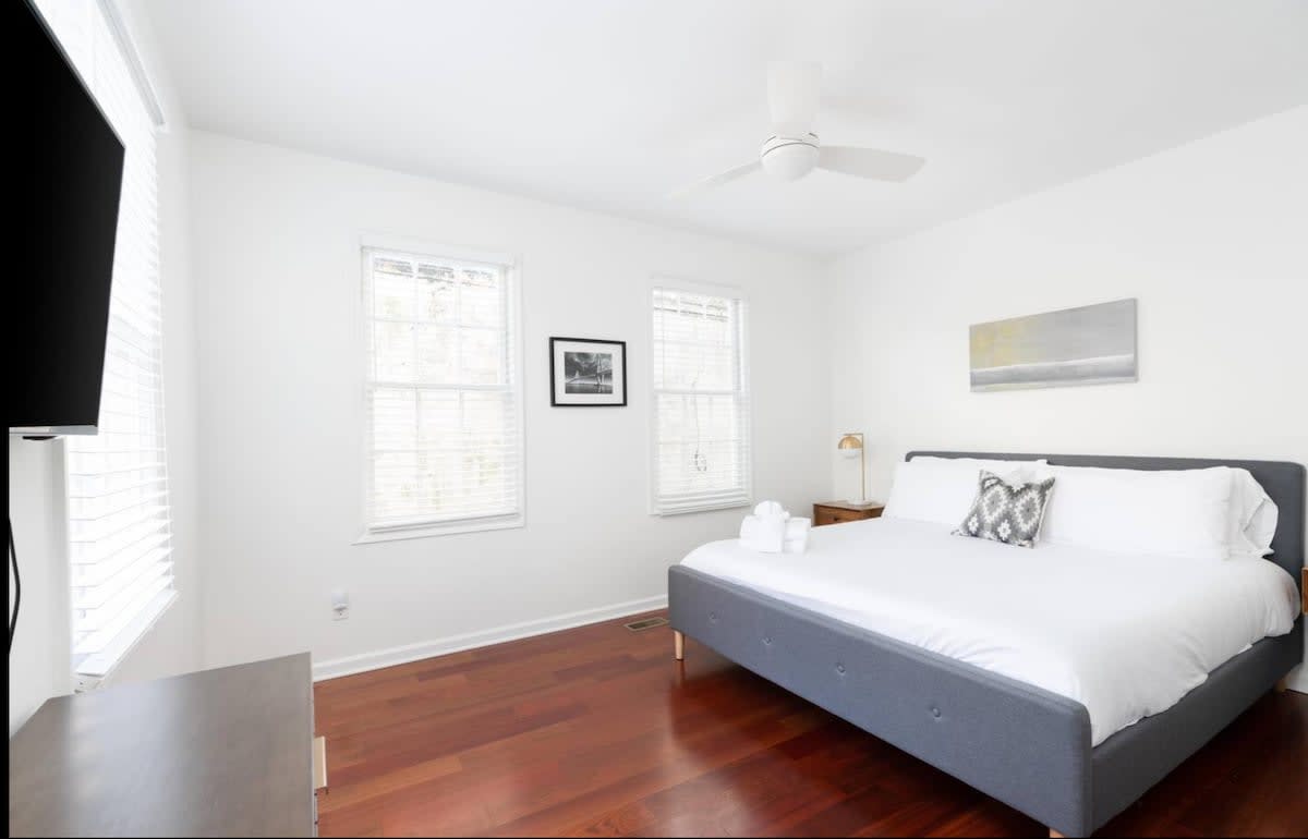 Bedroom #1 with a King bed, TV and En-Suite!